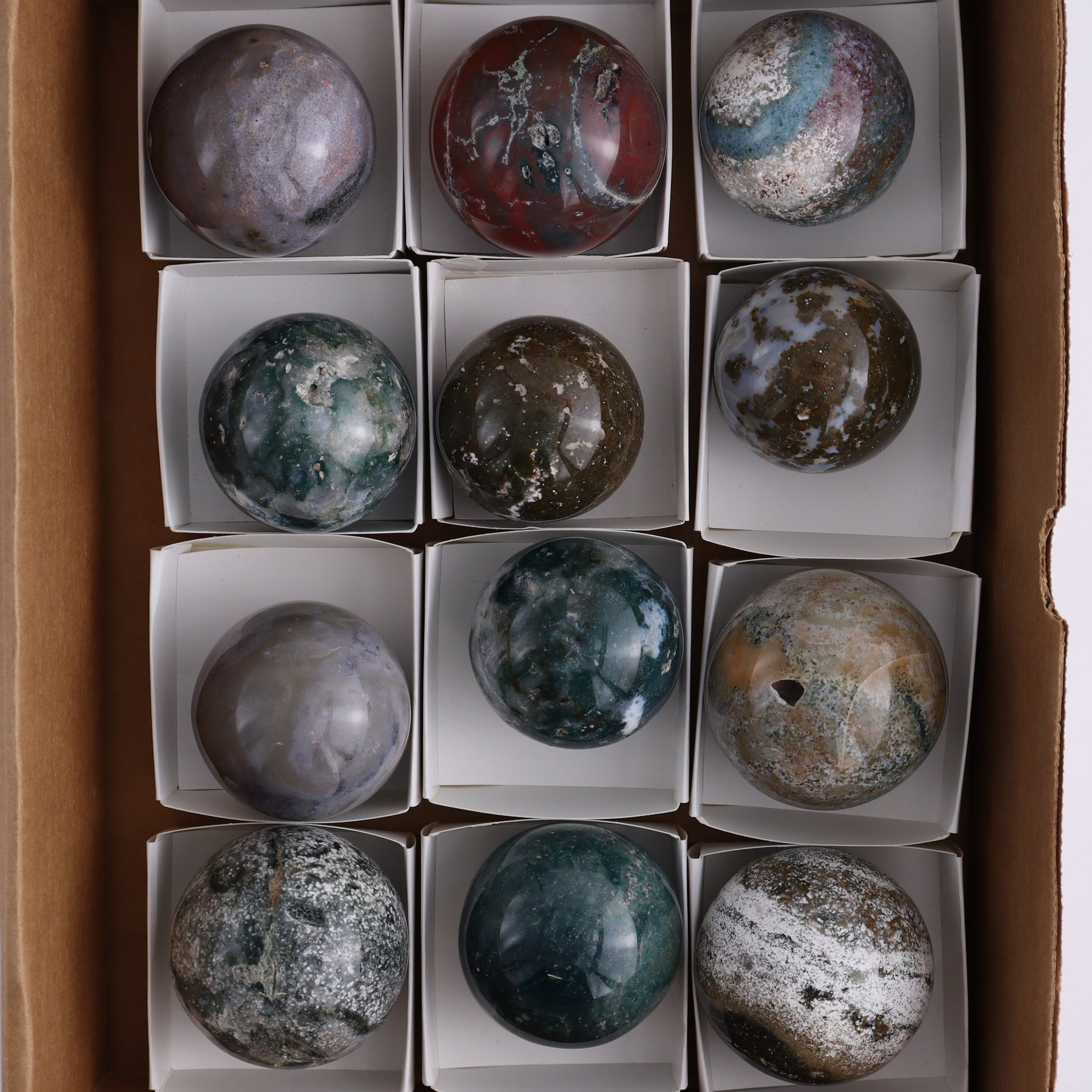 Ocean Jasper Spheres Set of 12 - Expert Wholesale and Supplier of Wholesale Crystals & Bulk Gemstones, ["jasper","Madagascar","Ocean Jasper","Spheres"]