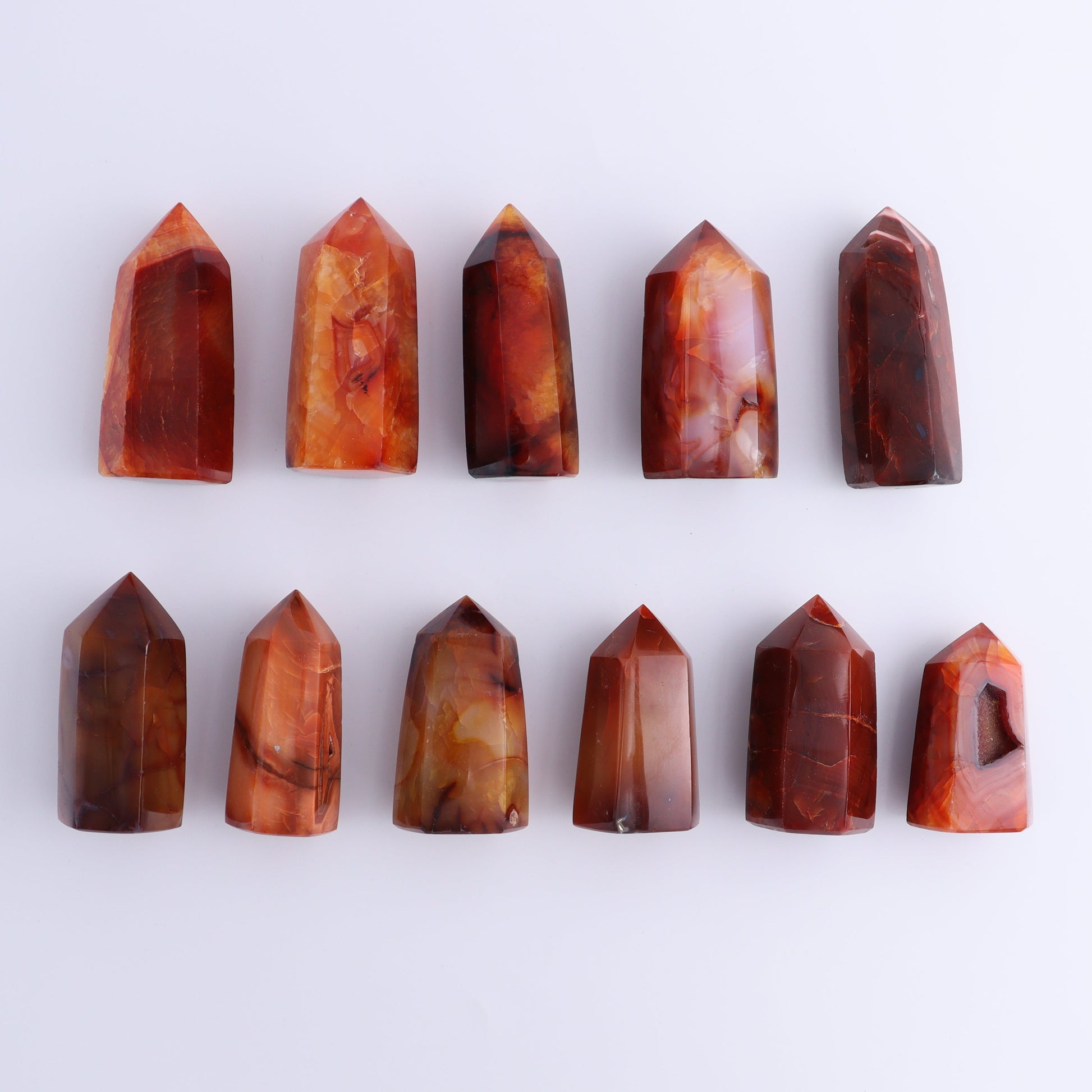 Carnelian Towers Set of 11 - Expert Wholesale and Supplier of Wholesale Crystals & Bulk Gemstones, ["carnelian","Madagascar","Towers"]