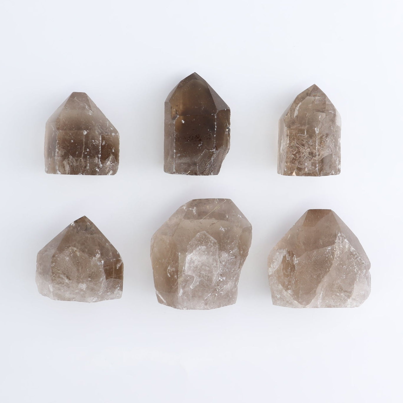 Smoky Quartz Polished Tops Set of 35 - Expert Wholesale and Supplier of Wholesale Crystals & Bulk Gemstones, ["Brazil","Points","Polished Tip","Quartz","Smoky Quartz"]