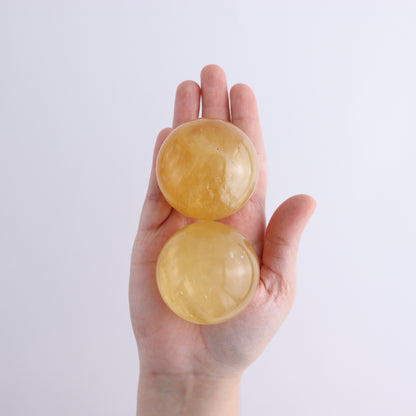Honey Calcite Spheres Set of 12 - Expert Wholesale and Supplier of Wholesale Crystals & Bulk Gemstones, ["Calcite","Honey Calcite","Mexico","Spheres"]