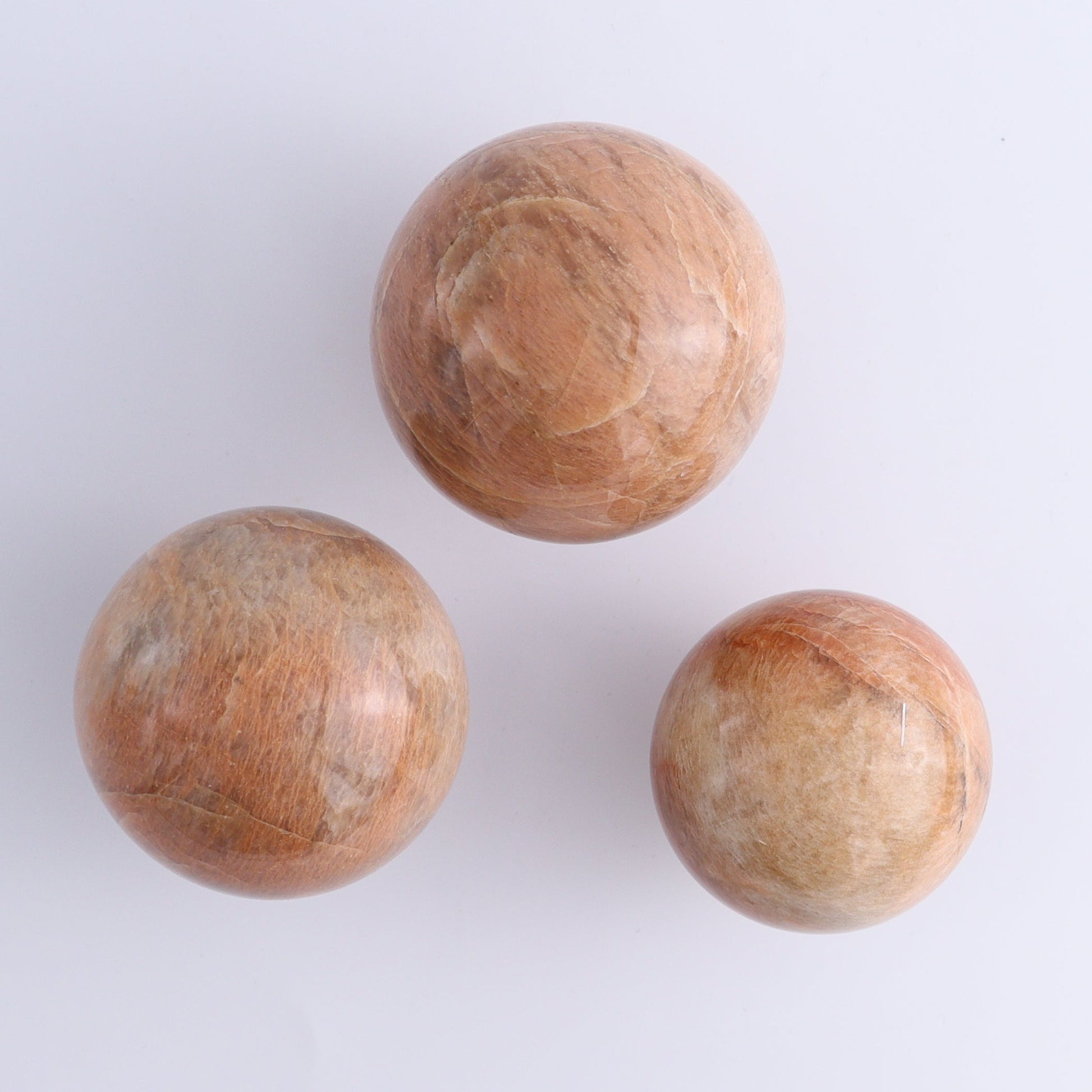 Peach Moonstone Spheres Set of 12 - Expert Wholesale and Supplier of Wholesale Crystals & Bulk Gemstones, ["close_50","Freeforms","Peach Moonstone"]