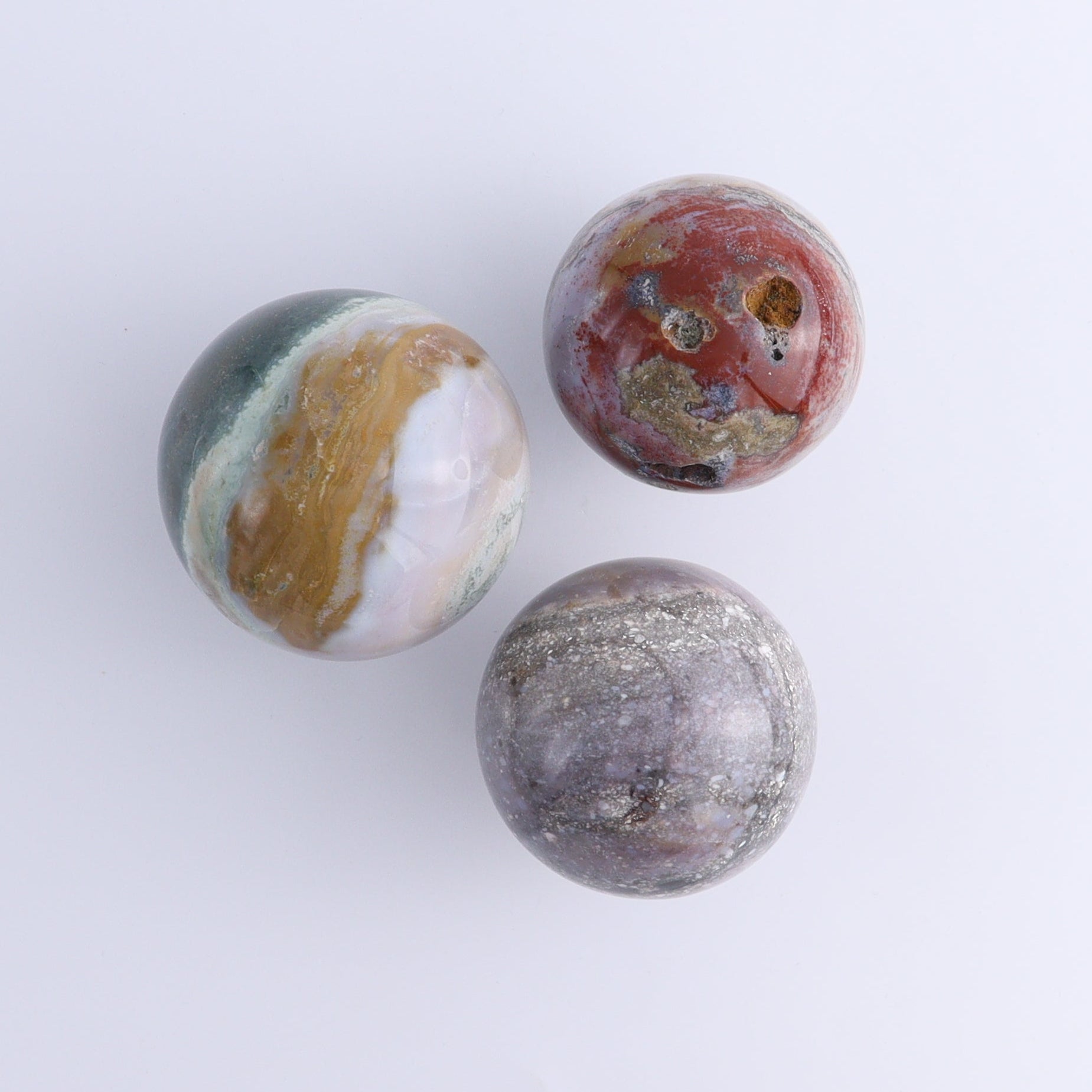 Ocean Jasper Spheres Set of 12 - Expert Wholesale and Supplier of Wholesale Crystals & Bulk Gemstones, ["jasper","Madagascar","Ocean Jasper","Spheres"]