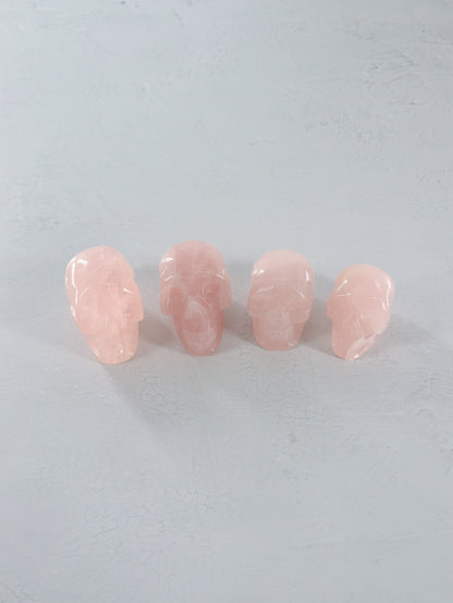 Rose Quartz Skulls Set of 4 - Expert Vendor of Wholesale Crystals