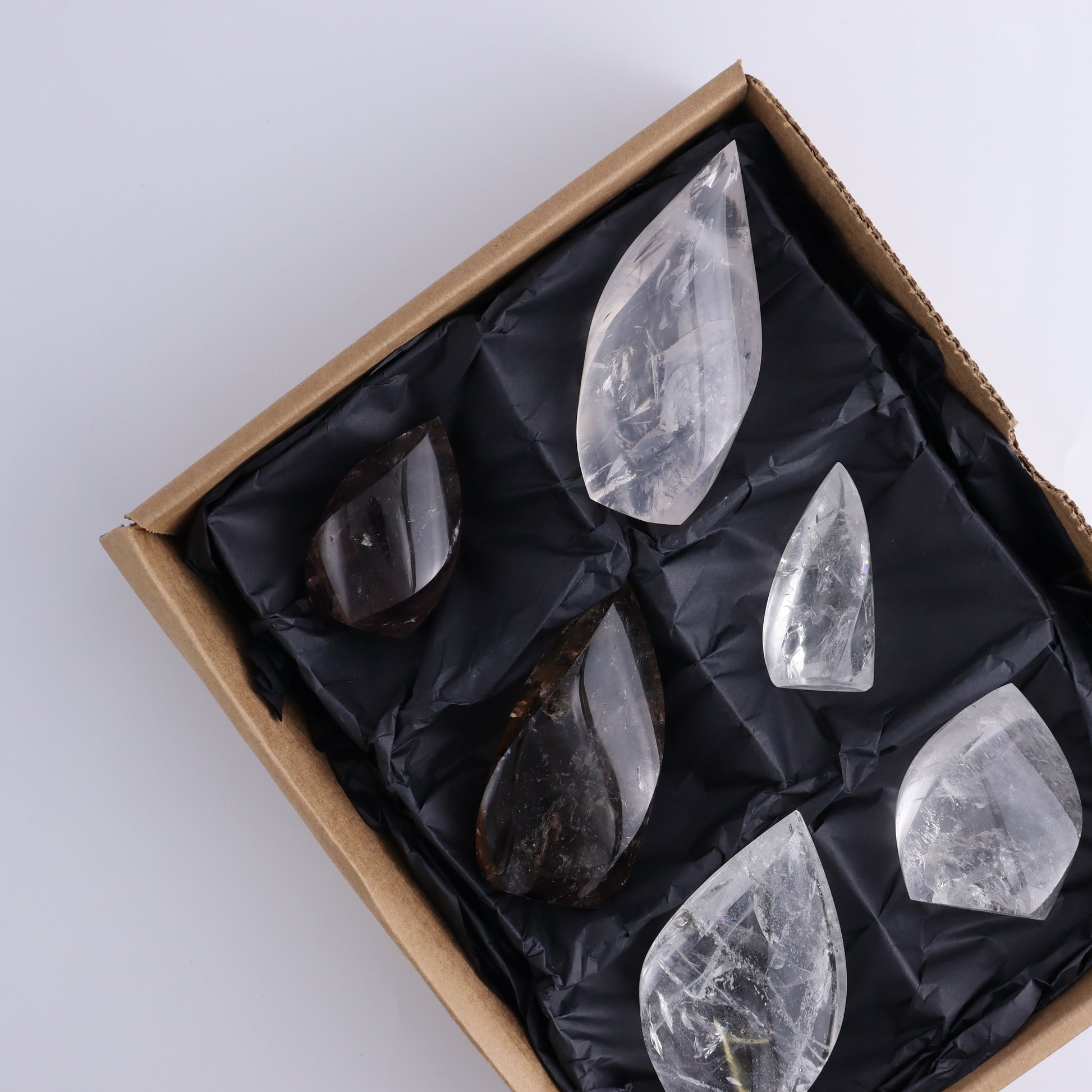 Imperfect Clear and Smoky Quartz Flames Set of 6 - Expert Wholesale and Supplier of Wholesale Crystals & Bulk Gemstones, ["Brazil","Clear Quartz","flames","Quartz","Smoky Quartz"]