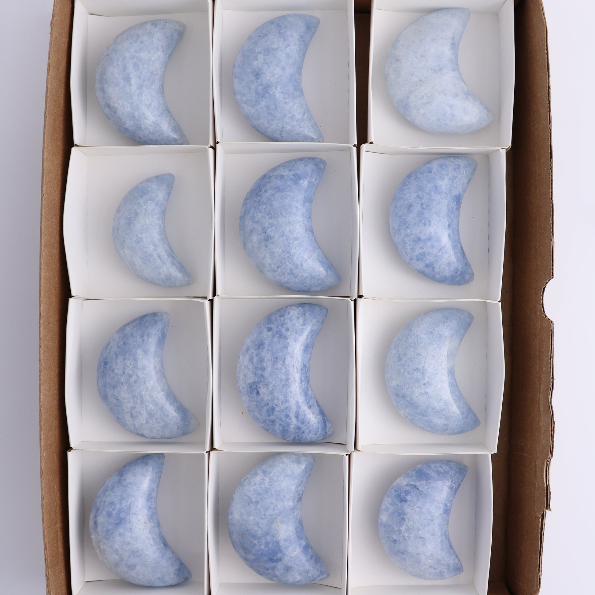 Blue Calcite Moons Set of 12 - Expert Wholesale and Supplier of Wholesale Crystals & Bulk Gemstones, ["Blue Calcite","Calcite","moons"]