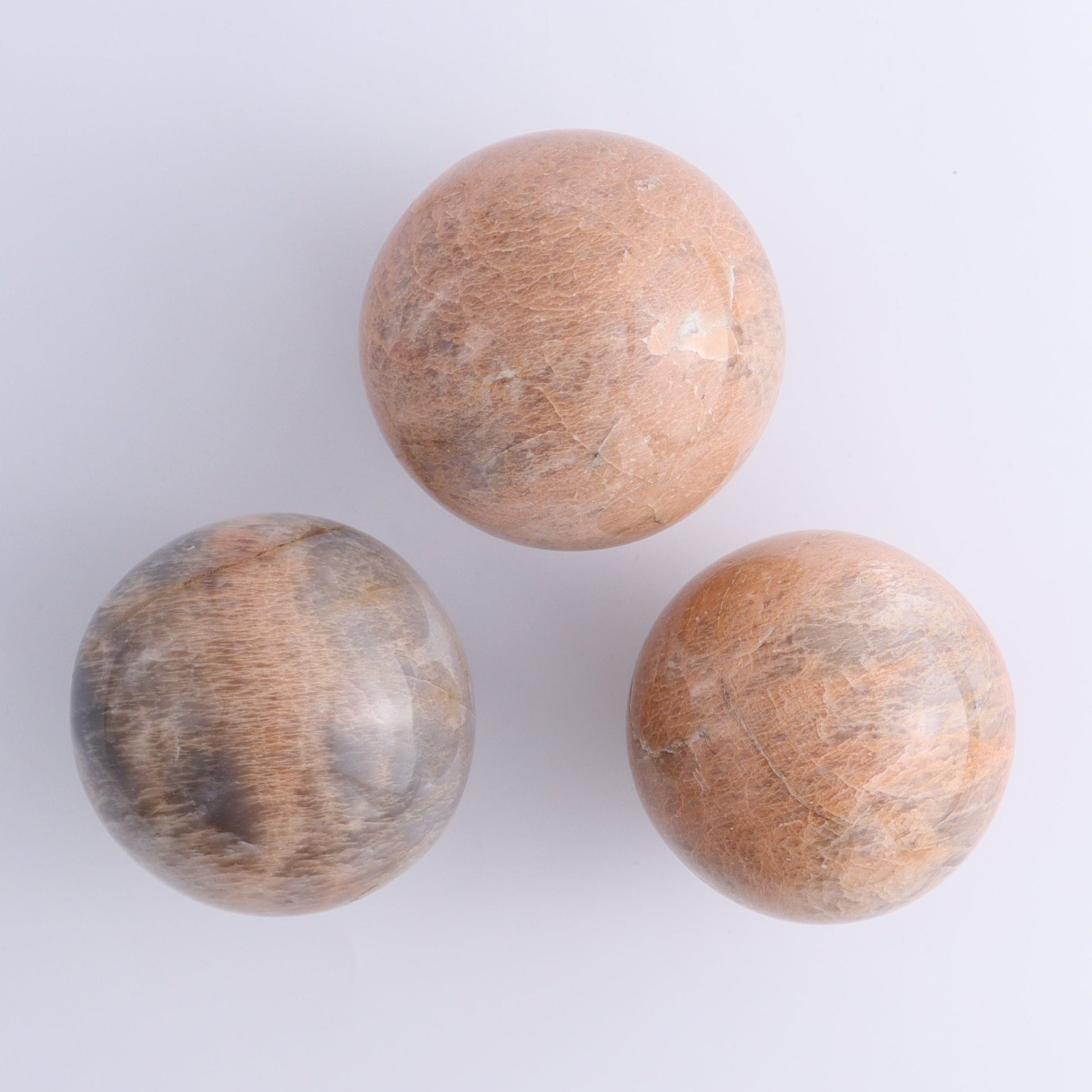 Peach Moonstone Spheres Set of 12 - Expert Wholesale and Supplier of Wholesale Crystals & Bulk Gemstones, ["close_50","Freeforms","Peach Moonstone"]
