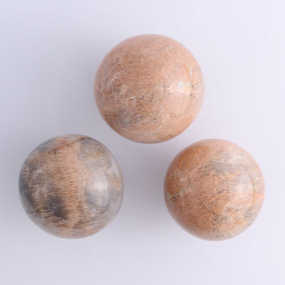 Peach Moonstone Spheres Set of 12 - Expert Wholesale and Supplier of Wholesale Crystals & Bulk Gemstones, ["close_50","Freeforms","Peach Moonstone"]