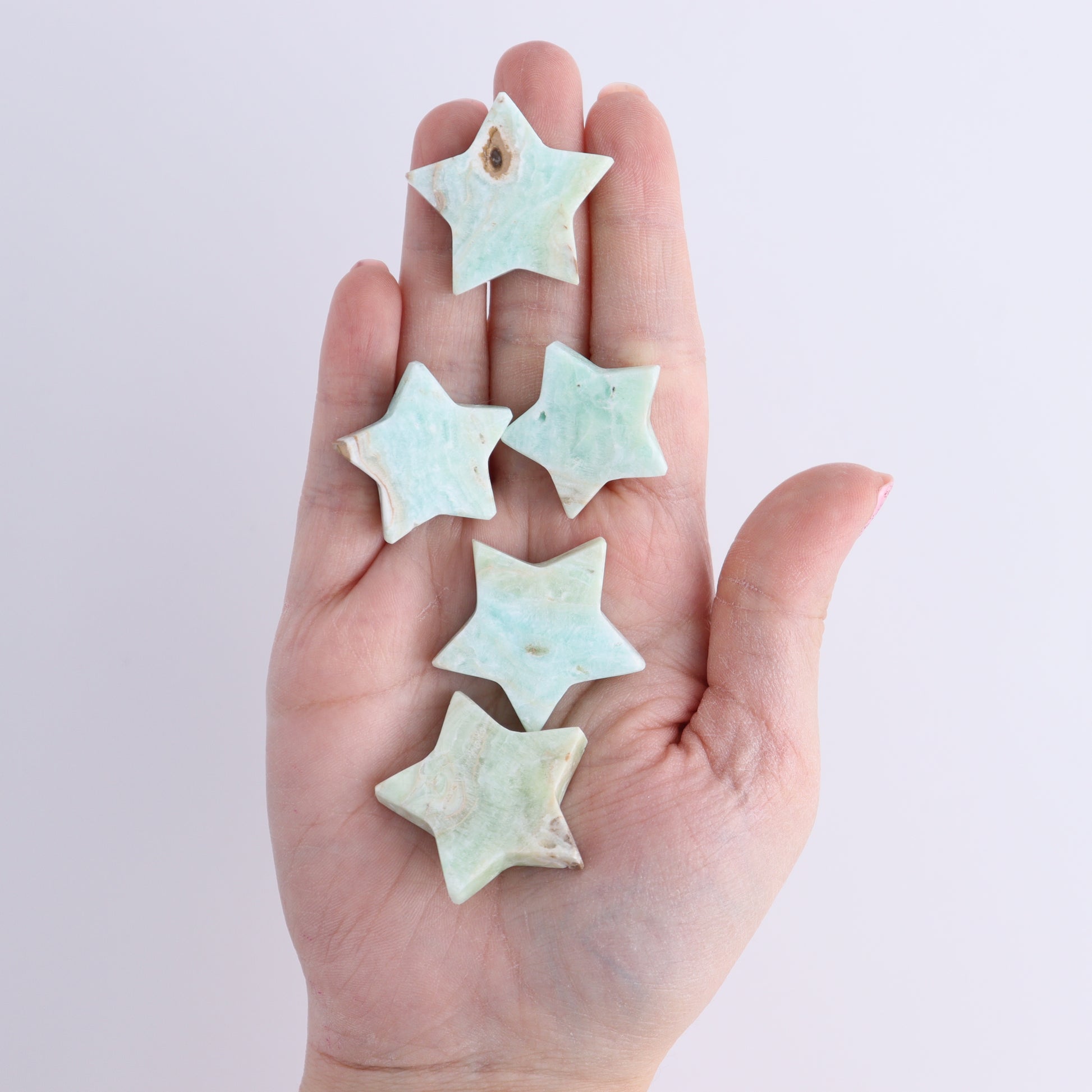 One Caribbean Calcite Little Star - Expert Wholesale and Supplier of Wholesale Crystals & Bulk Gemstones, ["Calcite","Caribbean Calcite","Pakistan","stars"]