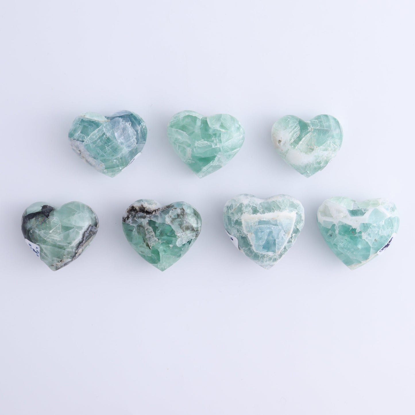 Fluorite Hearts Set of 7 - Expert Wholesale and Supplier of Wholesale Crystals & Bulk Gemstones, ["Fluorite","Hearts","Mexico"]
