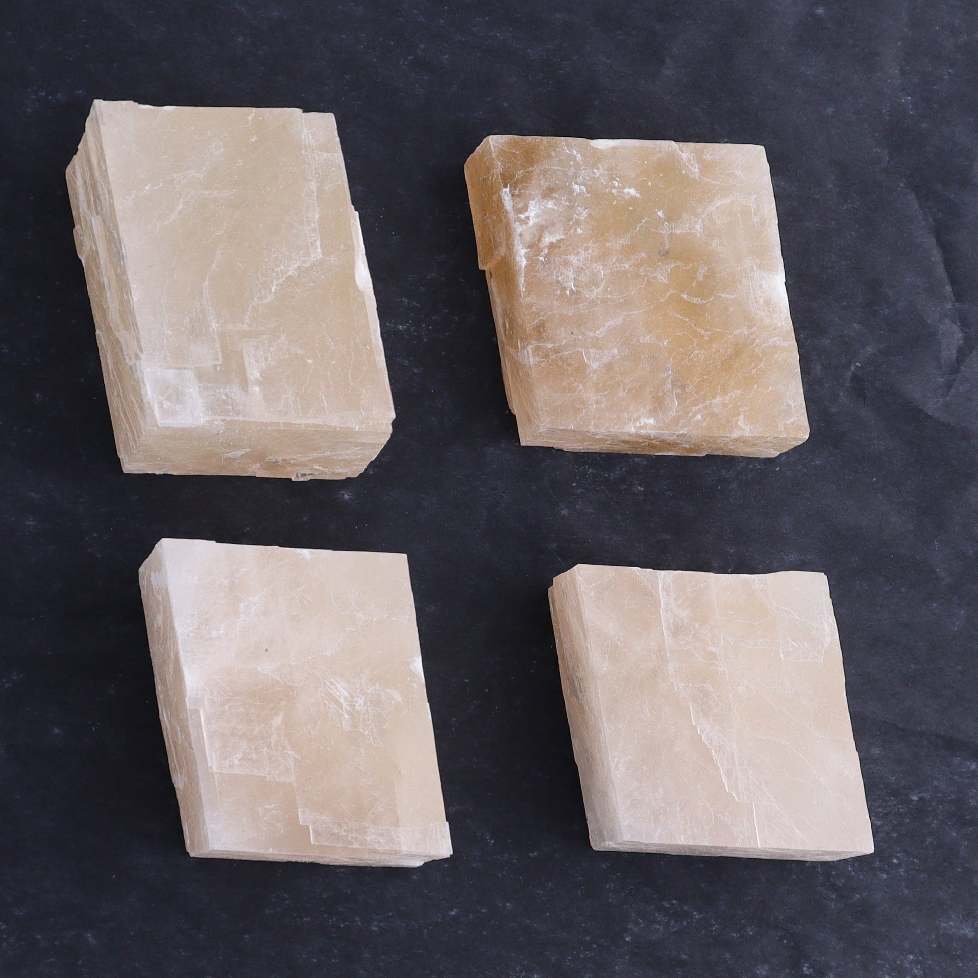 Pink Optical Calcite (Fluorescent) Set of 24 - Expert Wholesale and Supplier of Wholesale Crystals & Bulk Gemstones, ["Calcite","Mexico","Optical Calcite"]