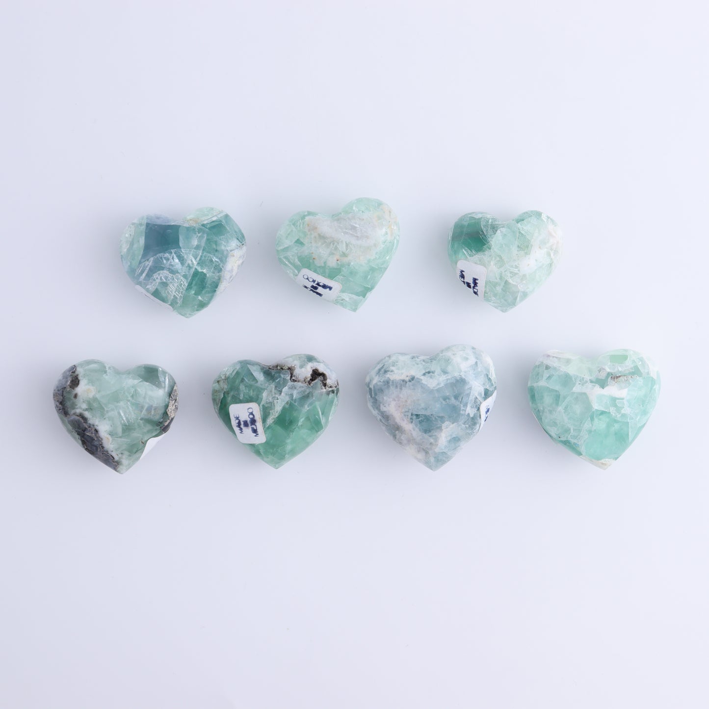 Fluorite Hearts Set of 7 - Expert Wholesale and Supplier of Wholesale Crystals & Bulk Gemstones, ["Fluorite","Hearts","Mexico"]
