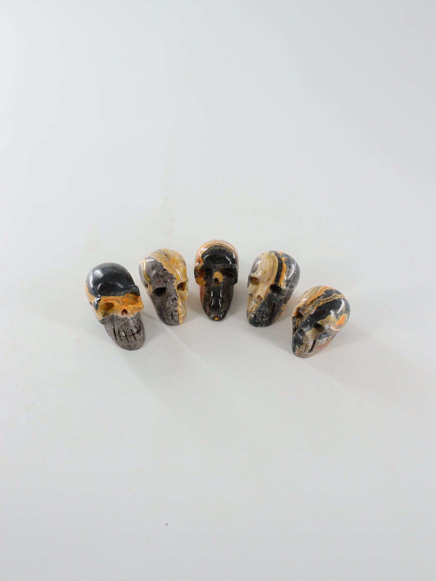 Bumblebee Jasper Skulls Set of 5 - Expert Wholesale and Supplier of Wholesale Crystals & Bulk Gemstones, []