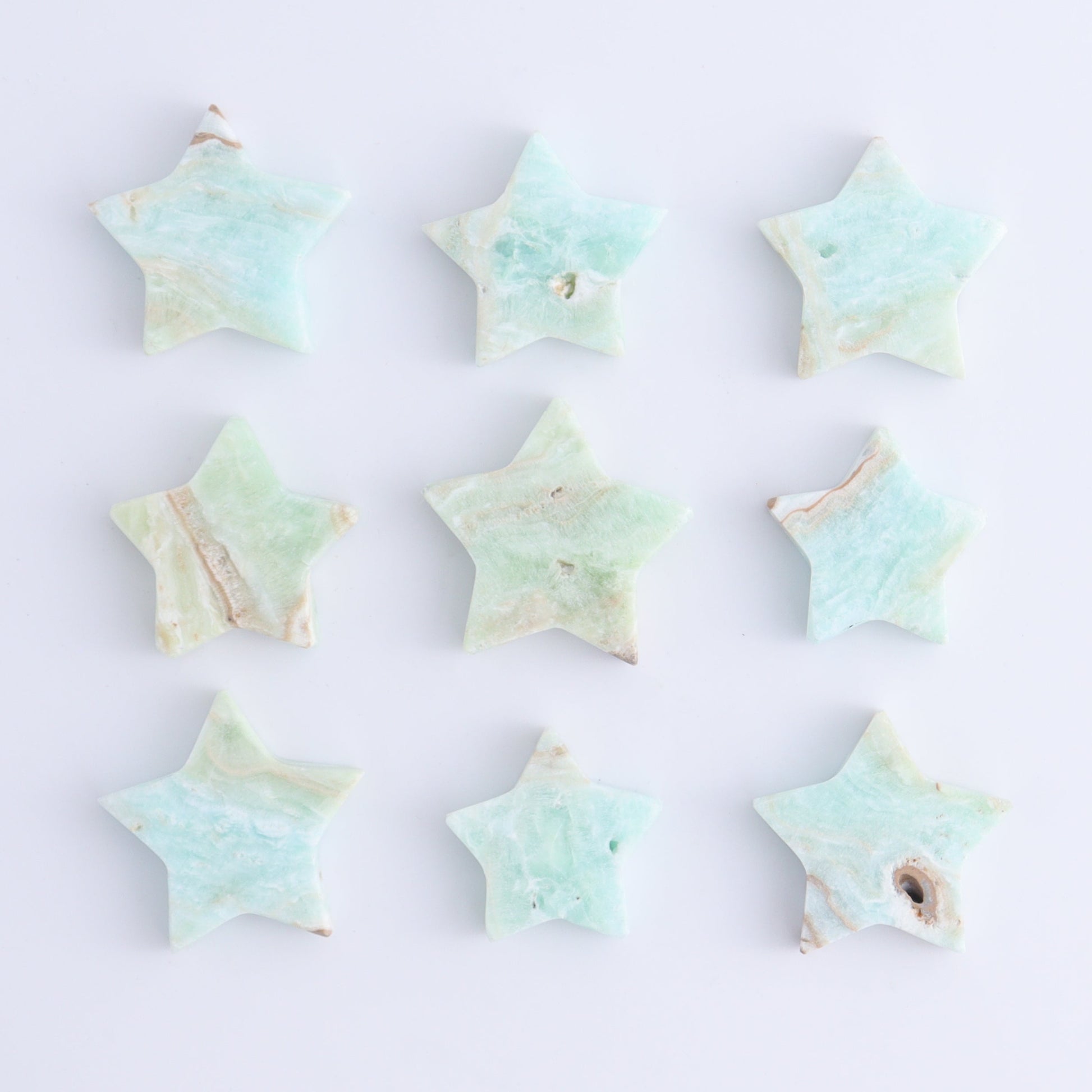 One Caribbean Calcite Little Star - Expert Wholesale and Supplier of Wholesale Crystals & Bulk Gemstones, ["Calcite","Caribbean Calcite","Pakistan","stars"]