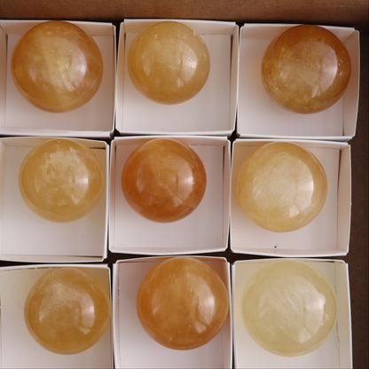 Honey Calcite Spheres Set of 12 - Expert Wholesale and Supplier of Wholesale Crystals & Bulk Gemstones, ["Calcite","Honey Calcite","Mexico","Spheres"]