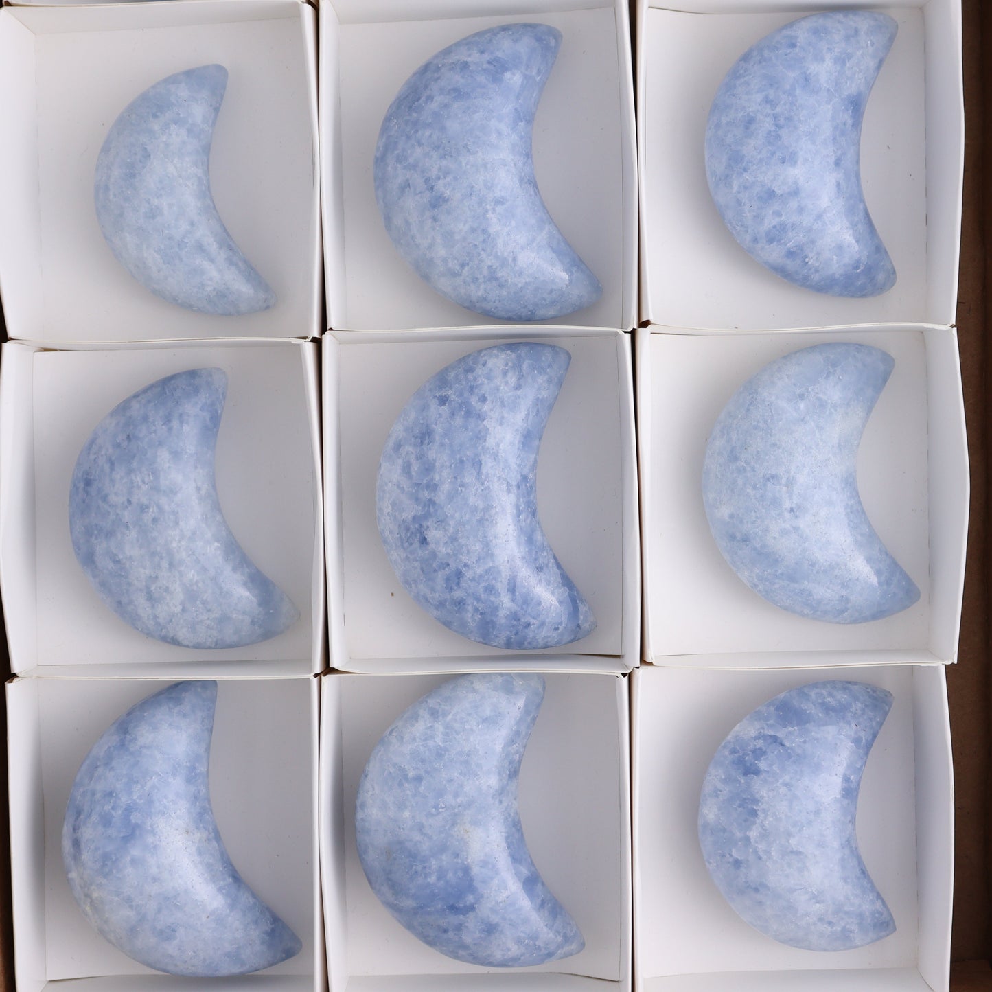 Blue Calcite Moons Set of 12 - Expert Wholesale and Supplier of Wholesale Crystals & Bulk Gemstones, ["Blue Calcite","Calcite","moons"]