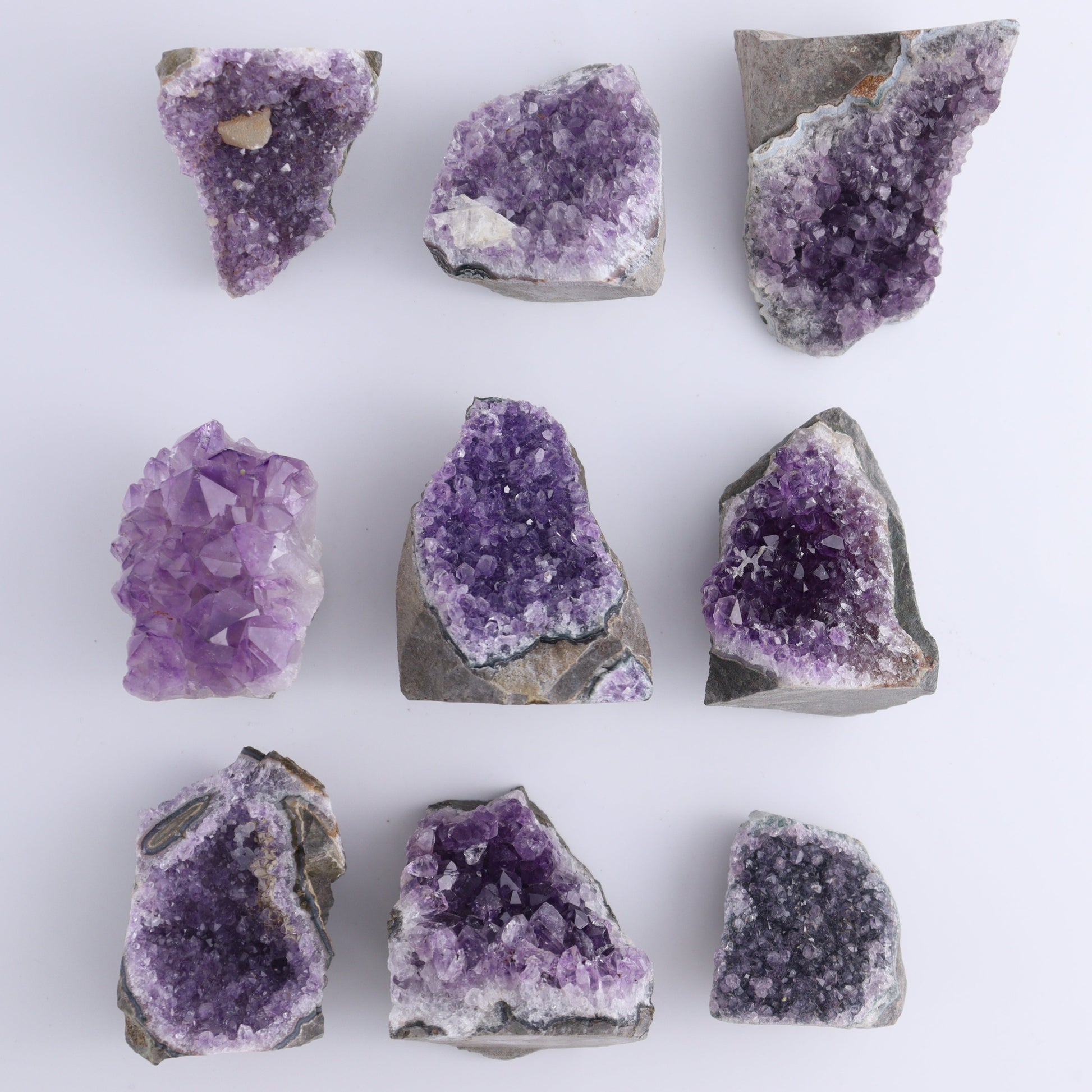 Amethyst Cut Bases Set of 24 - Expert Wholesale and Supplier of Wholesale Crystals & Bulk Gemstones, ["Amethyst","Cut Base","Freeforms"]