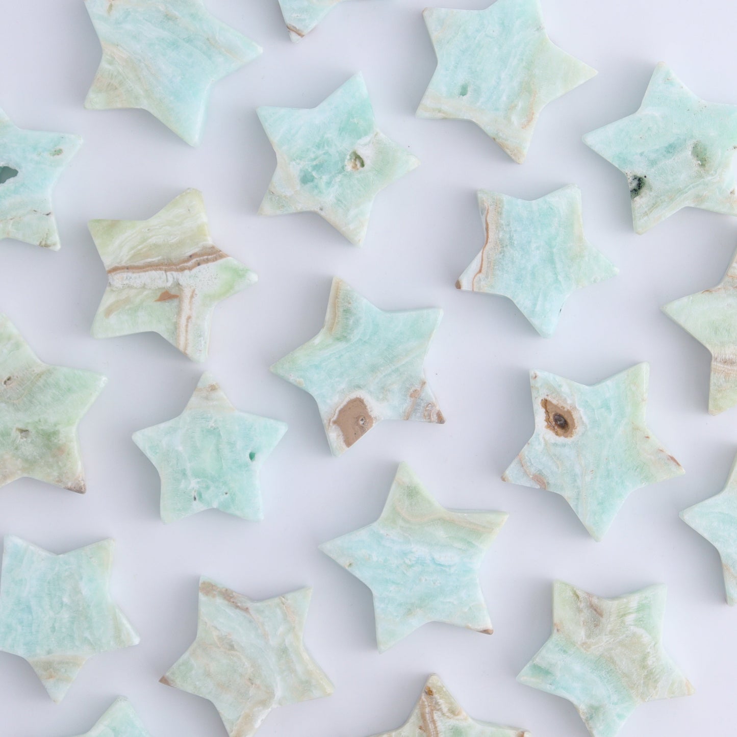 One Caribbean Calcite Little Star - Expert Wholesale and Supplier of Wholesale Crystals & Bulk Gemstones, ["Calcite","Caribbean Calcite","Pakistan","stars"]
