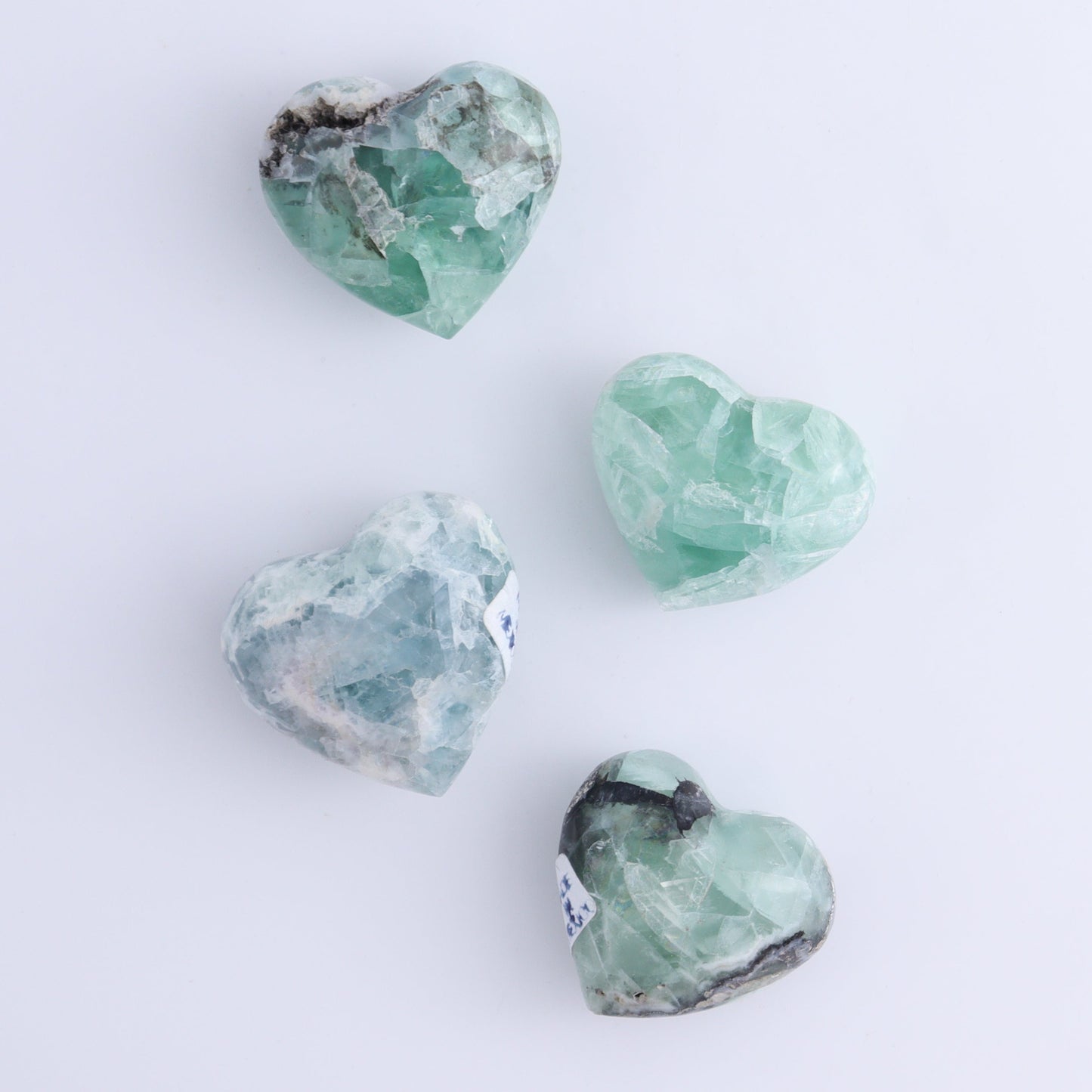 Fluorite Hearts Set of 7 - Expert Wholesale and Supplier of Wholesale Crystals & Bulk Gemstones, ["Fluorite","Hearts","Mexico"]