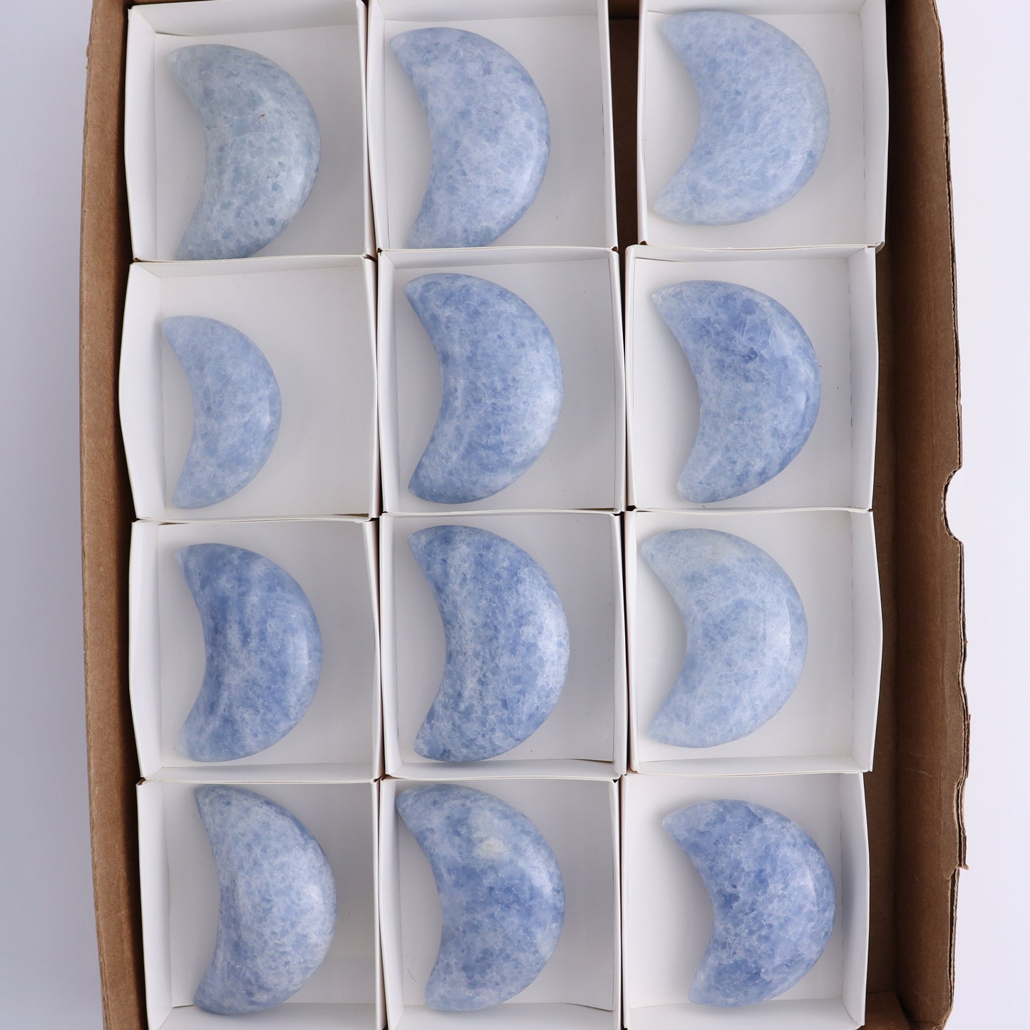 Blue Calcite Moons Set of 12 - Expert Wholesale and Supplier of Wholesale Crystals & Bulk Gemstones, ["Blue Calcite","Calcite","moons"]