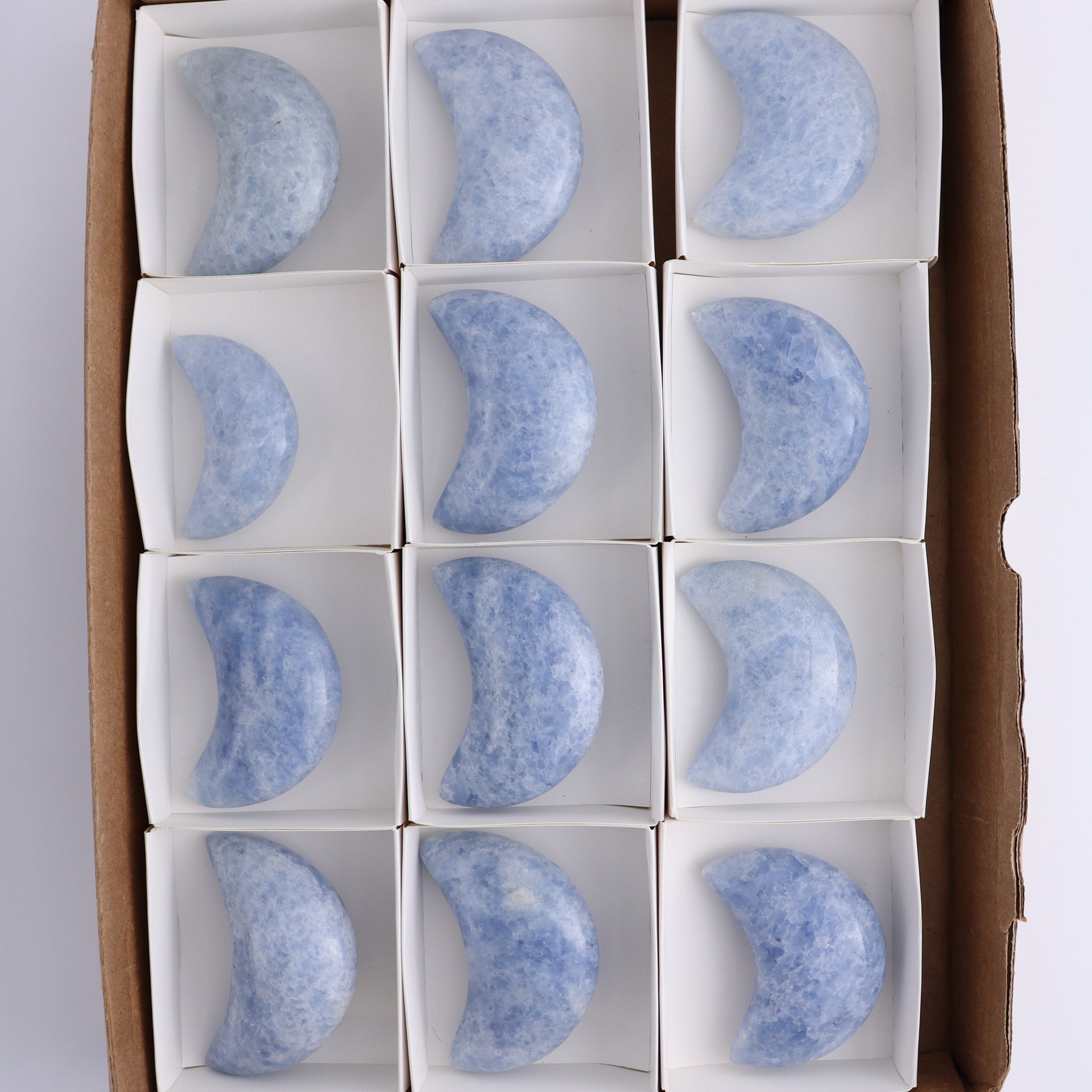 Blue Calcite Moons Set of 12 - Expert Wholesale and Supplier of Wholesale Crystals & Bulk Gemstones, ["Blue Calcite","Calcite","moons"]