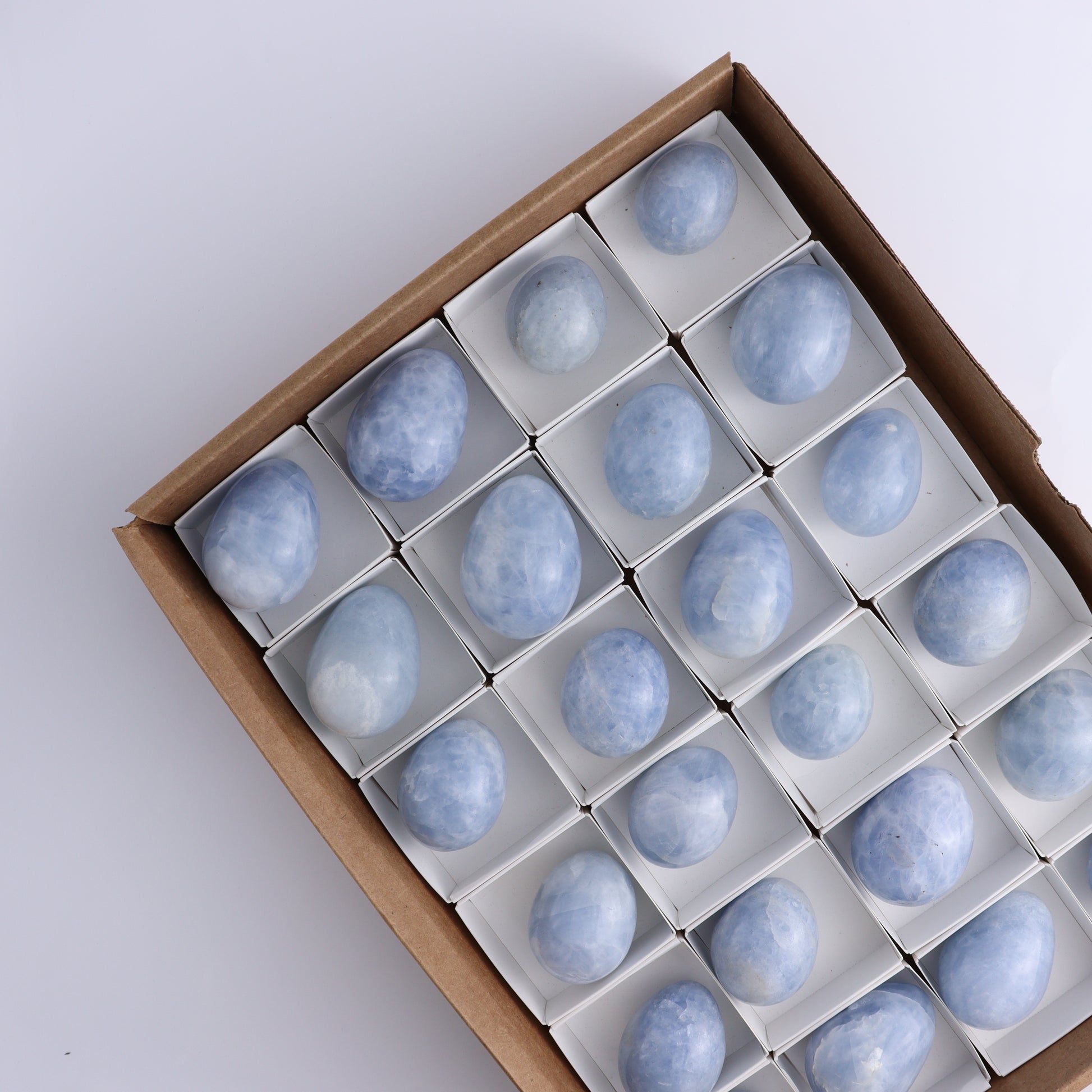 Blue Calcite Eggs Set of 35 - Expert Wholesale and Supplier of Wholesale Crystals & Bulk Gemstones, ["Blue Calcite","Calcite","close_30","Eggs"]