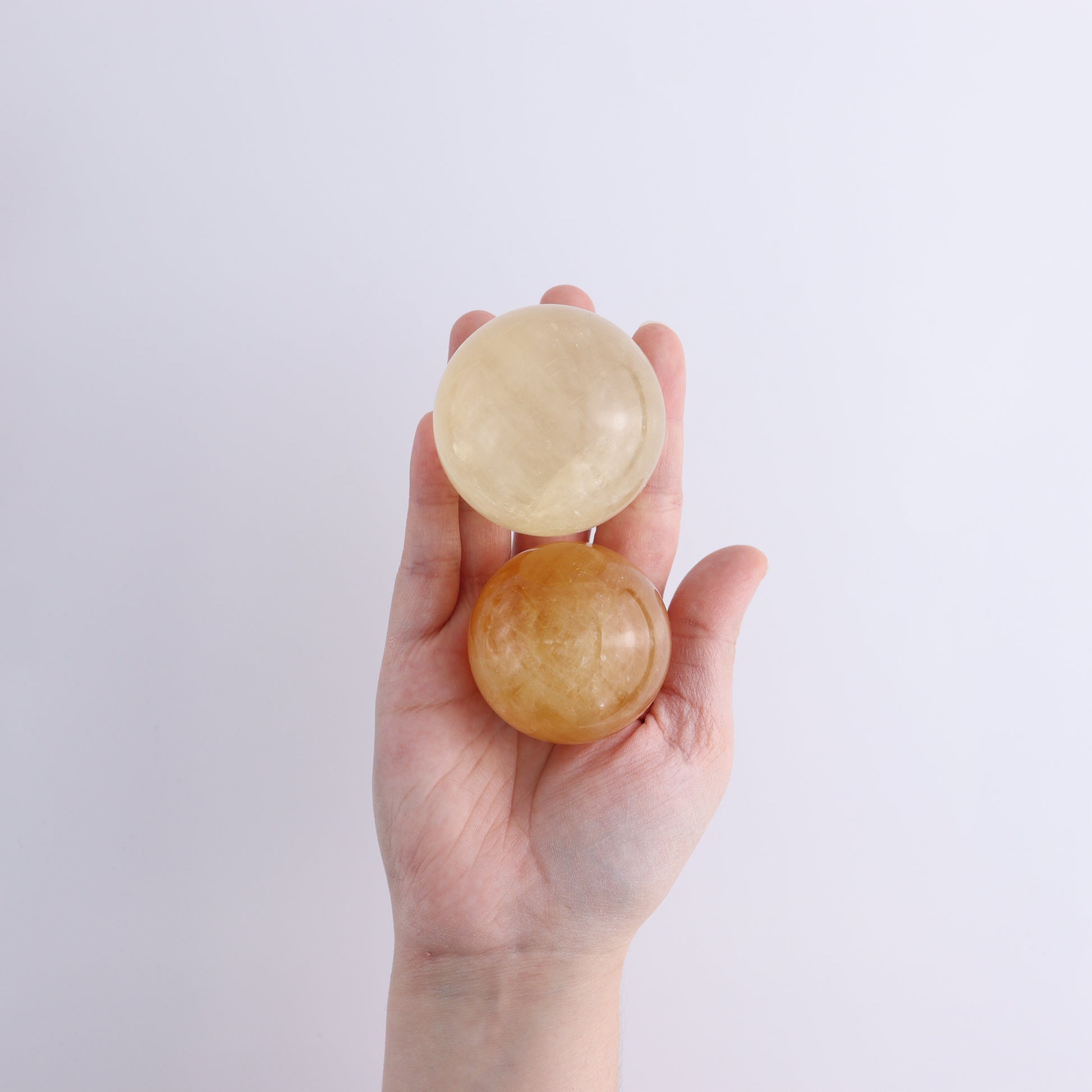 Honey Calcite Spheres Set of 12 - Expert Wholesale and Supplier of Wholesale Crystals & Bulk Gemstones, ["Calcite","Honey Calcite","Mexico","Spheres"]