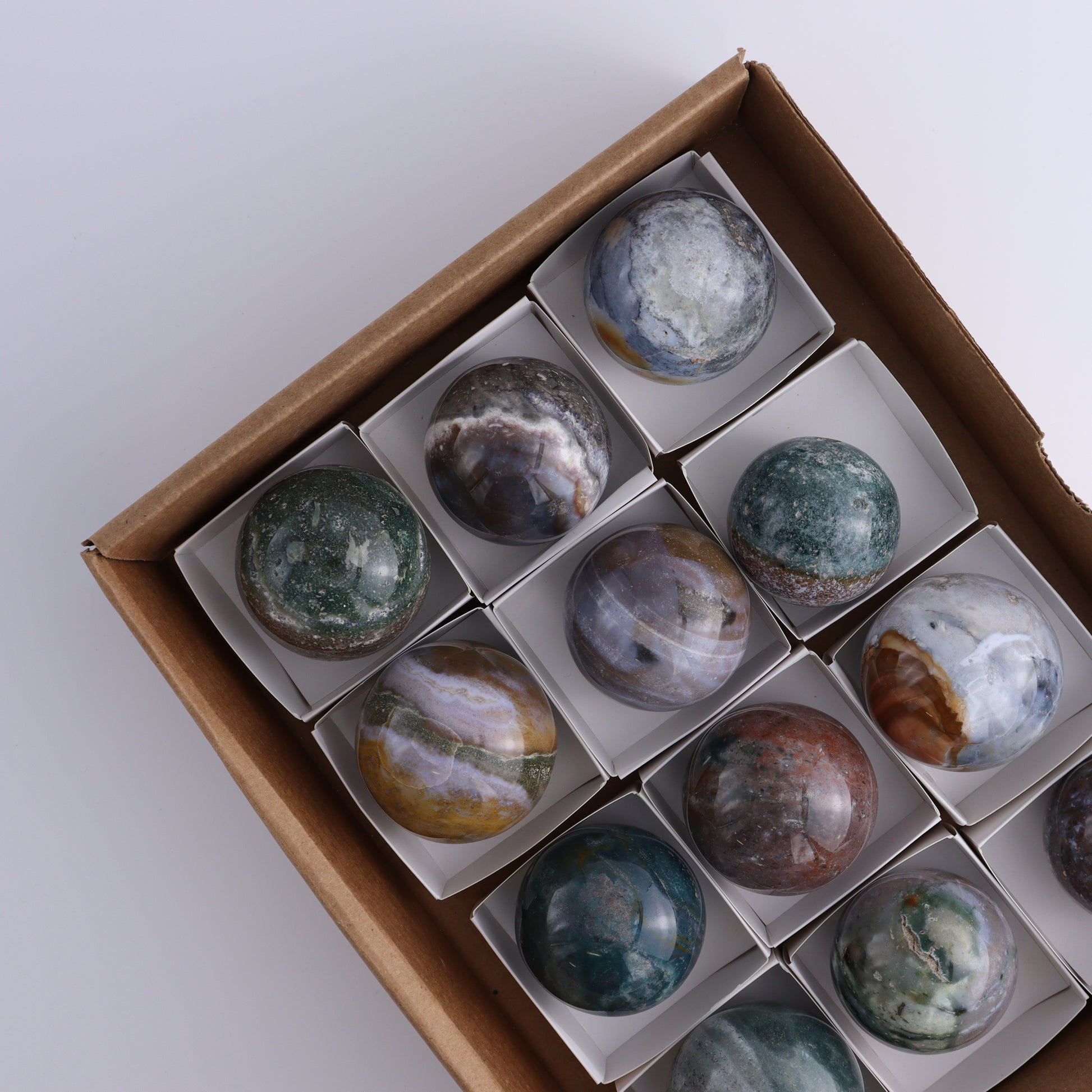 Ocean Jasper Spheres Set of 12 - Expert Wholesale and Supplier of Wholesale Crystals & Bulk Gemstones, ["jasper","Madagascar","Ocean Jasper","Spheres"]