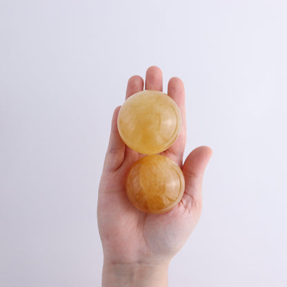 Honey Calcite Spheres Set of 12 - Expert Wholesale and Supplier of Wholesale Crystals & Bulk Gemstones, ["Calcite","Honey Calcite","Mexico","Spheres"]