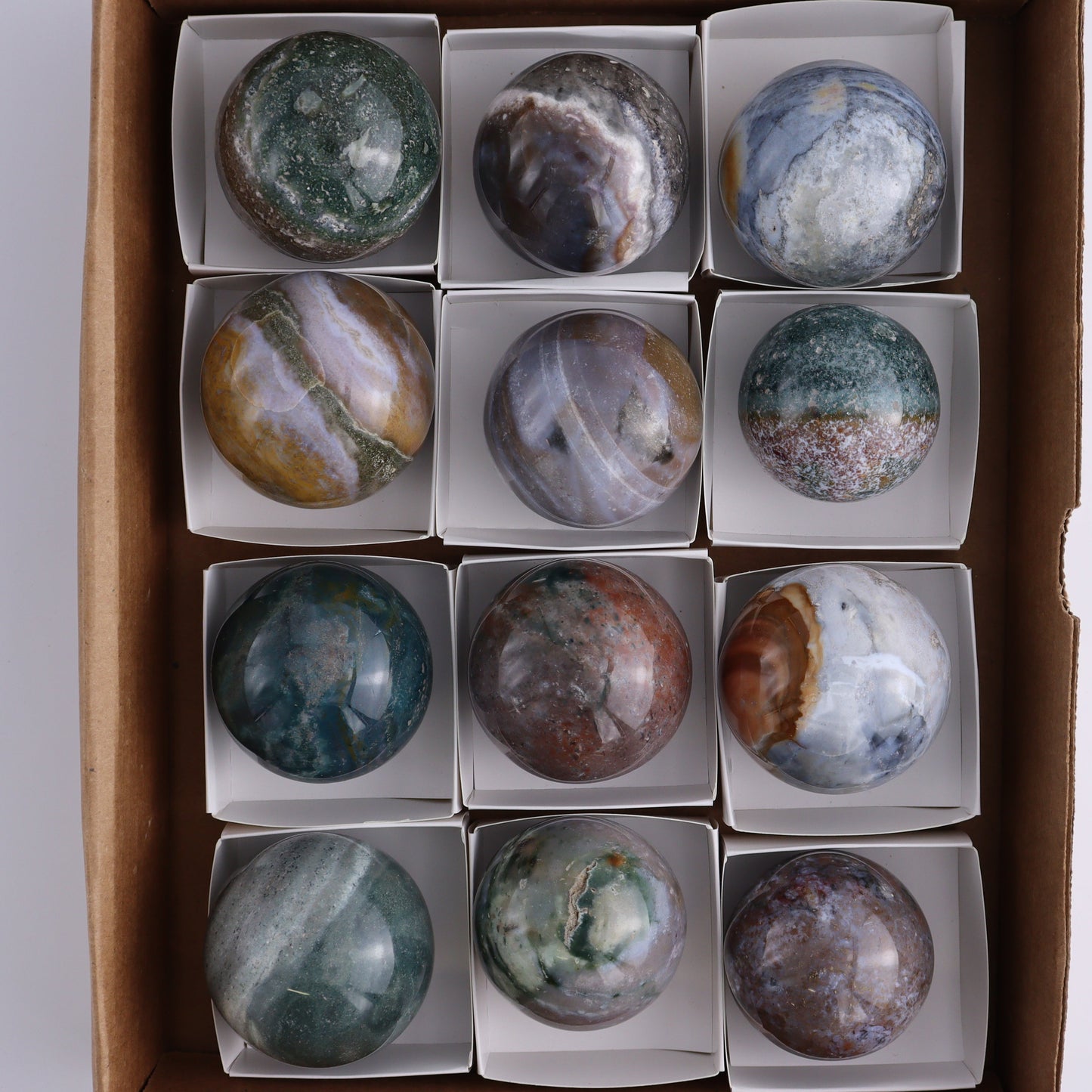 Ocean Jasper Spheres Set of 12 - Expert Wholesale and Supplier of Wholesale Crystals & Bulk Gemstones, ["jasper","Madagascar","Ocean Jasper","Spheres"]