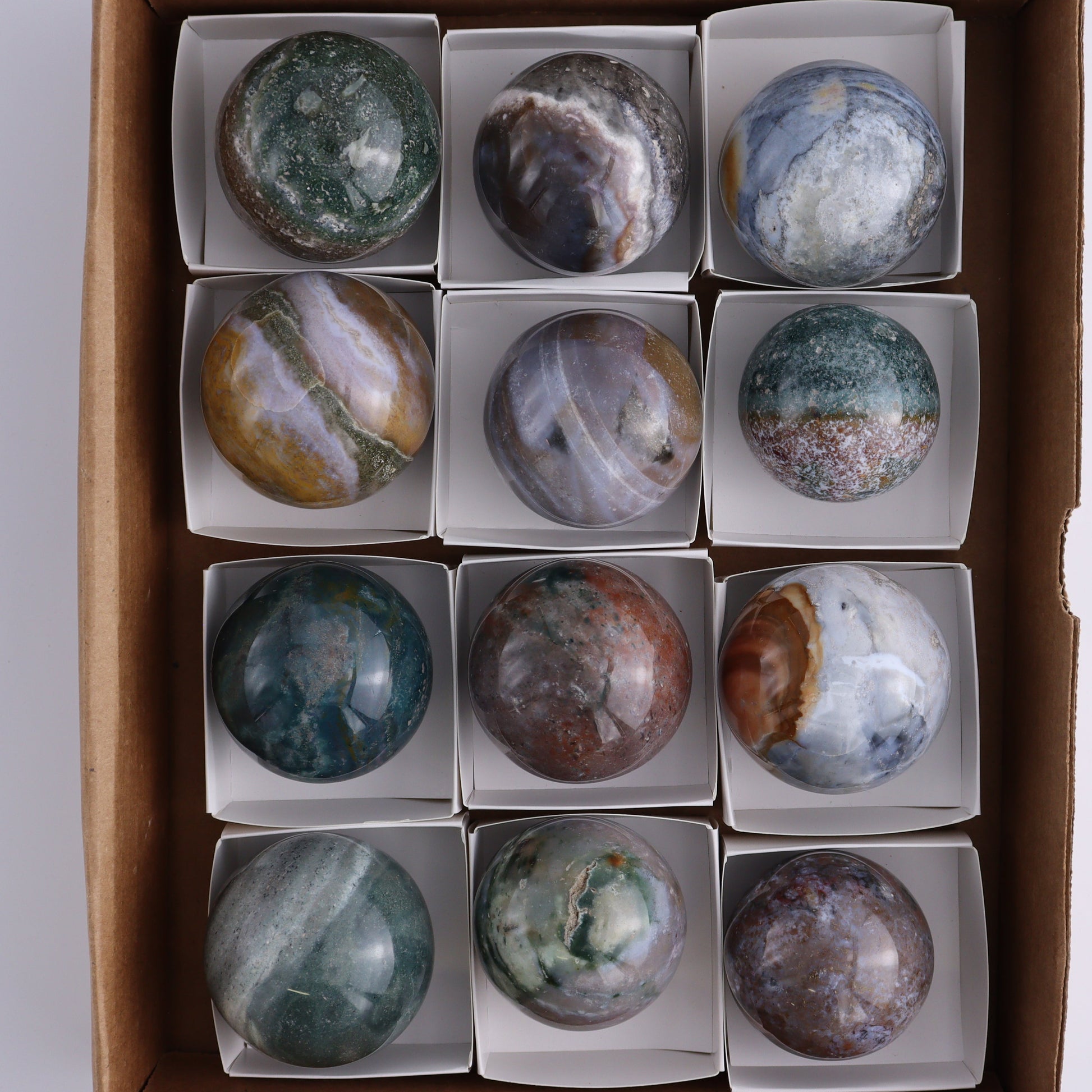 Ocean Jasper Spheres Set of 12 - Expert Wholesale and Supplier of Wholesale Crystals & Bulk Gemstones, ["jasper","Madagascar","Ocean Jasper","Spheres"]