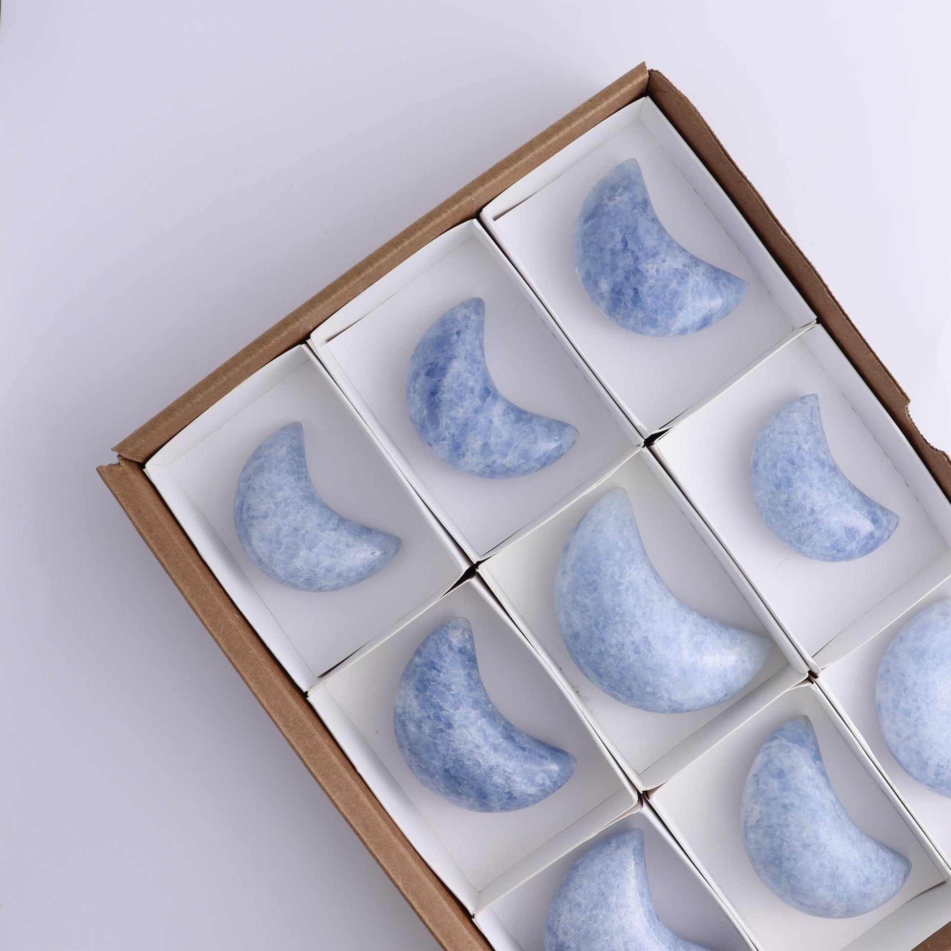 Blue Calcite Moons Set of 9 - Expert Wholesale and Supplier of Wholesale Crystals & Bulk Gemstones, ["Blue Calcite","Calcite","moons"]