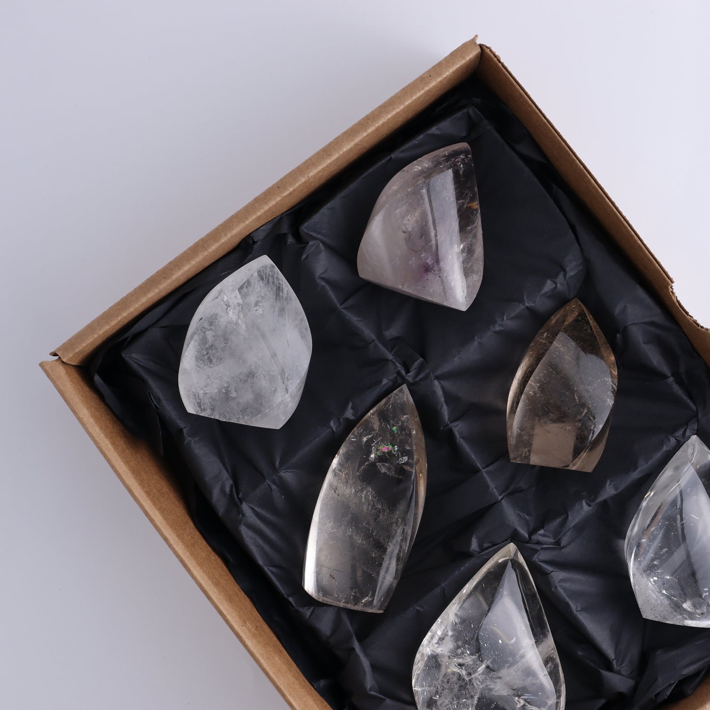 Imperfect Clear and Smoky Quartz Flames Set of 6 - Expert Wholesale and Supplier of Wholesale Crystals & Bulk Gemstones, ["Brazil","Clear Quartz","flames","Quartz","Smoky Quartz"]