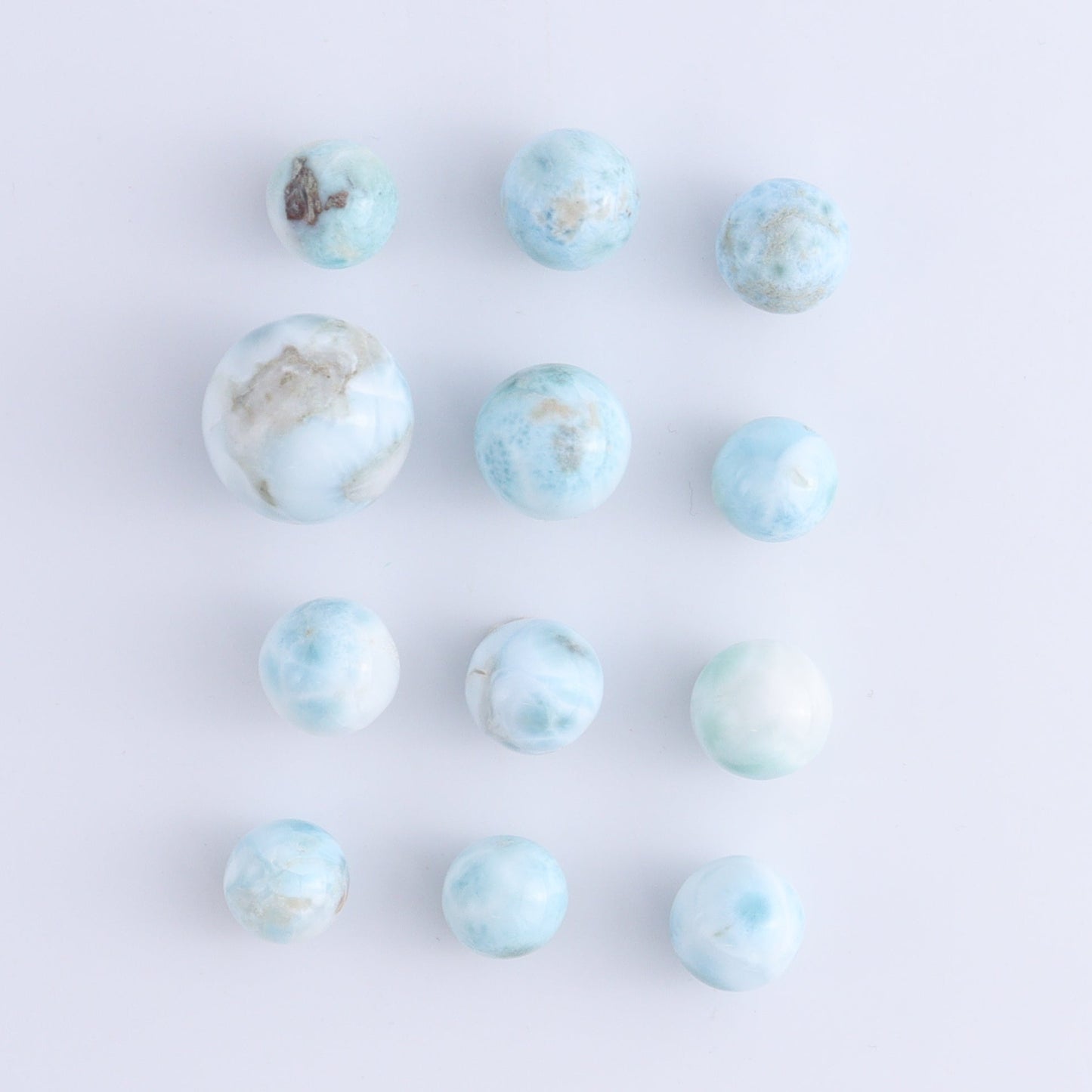 Larmiar Spheres Set of 12 - Expert Wholesale and Supplier of Wholesale Crystals & Bulk Gemstones, ["Larimar","Spheres"]