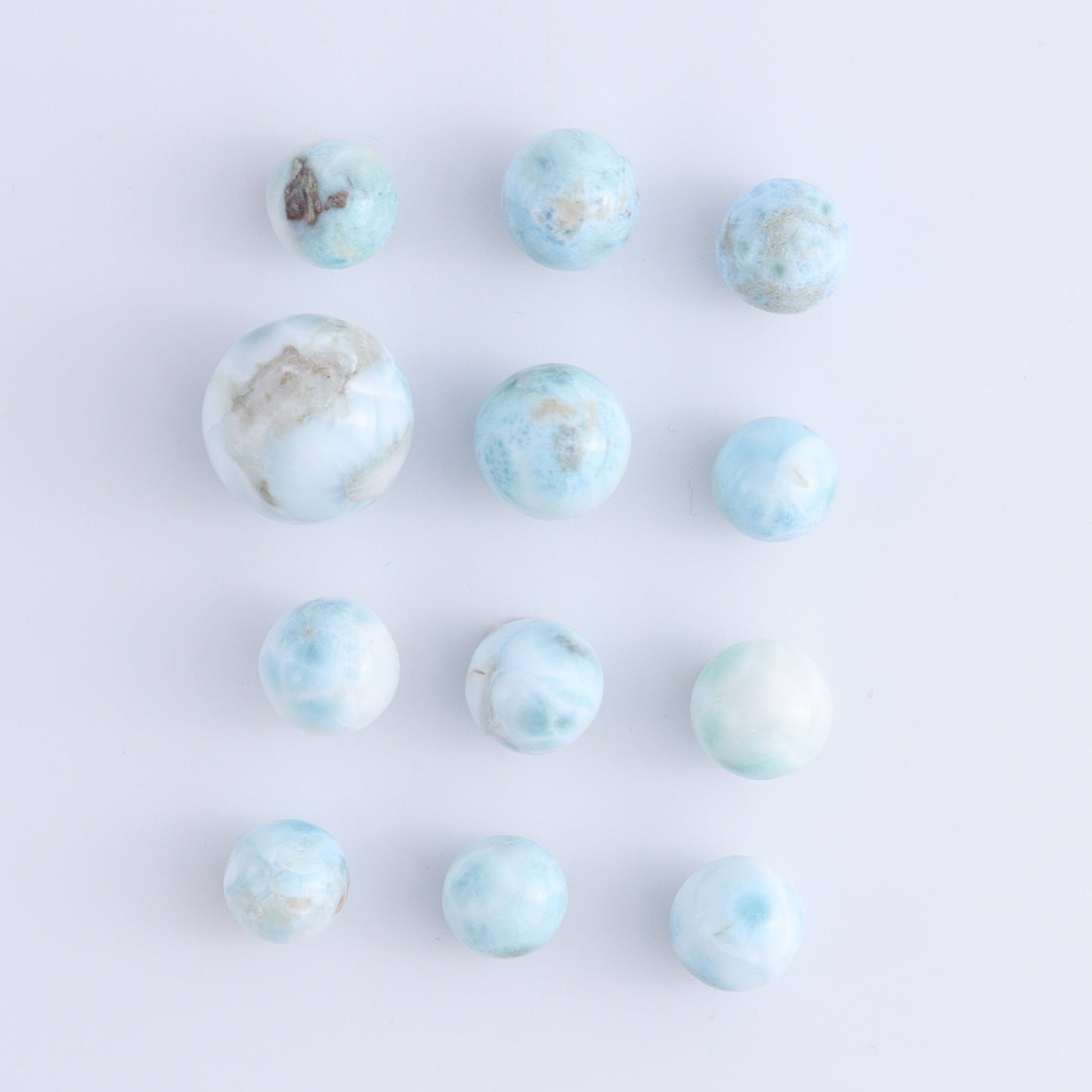 Larmiar Spheres Set of 12 - Expert Wholesale and Supplier of Wholesale Crystals & Bulk Gemstones, ["Larimar","Spheres"]