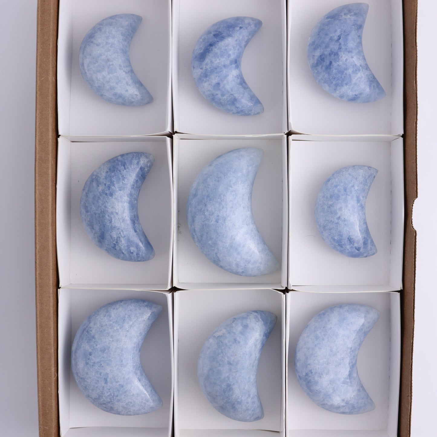 Blue Calcite Moons Set of 9 - Expert Wholesale and Supplier of Wholesale Crystals & Bulk Gemstones, ["Blue Calcite","Calcite","moons"]