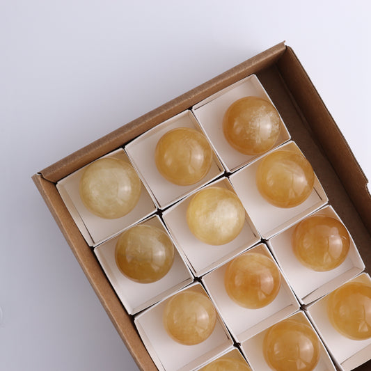 Honey Calcite Spheres Set of 12 - Expert Wholesale and Supplier of Wholesale Crystals & Bulk Gemstones, ["Calcite","Honey Calcite","Mexico","Spheres"]