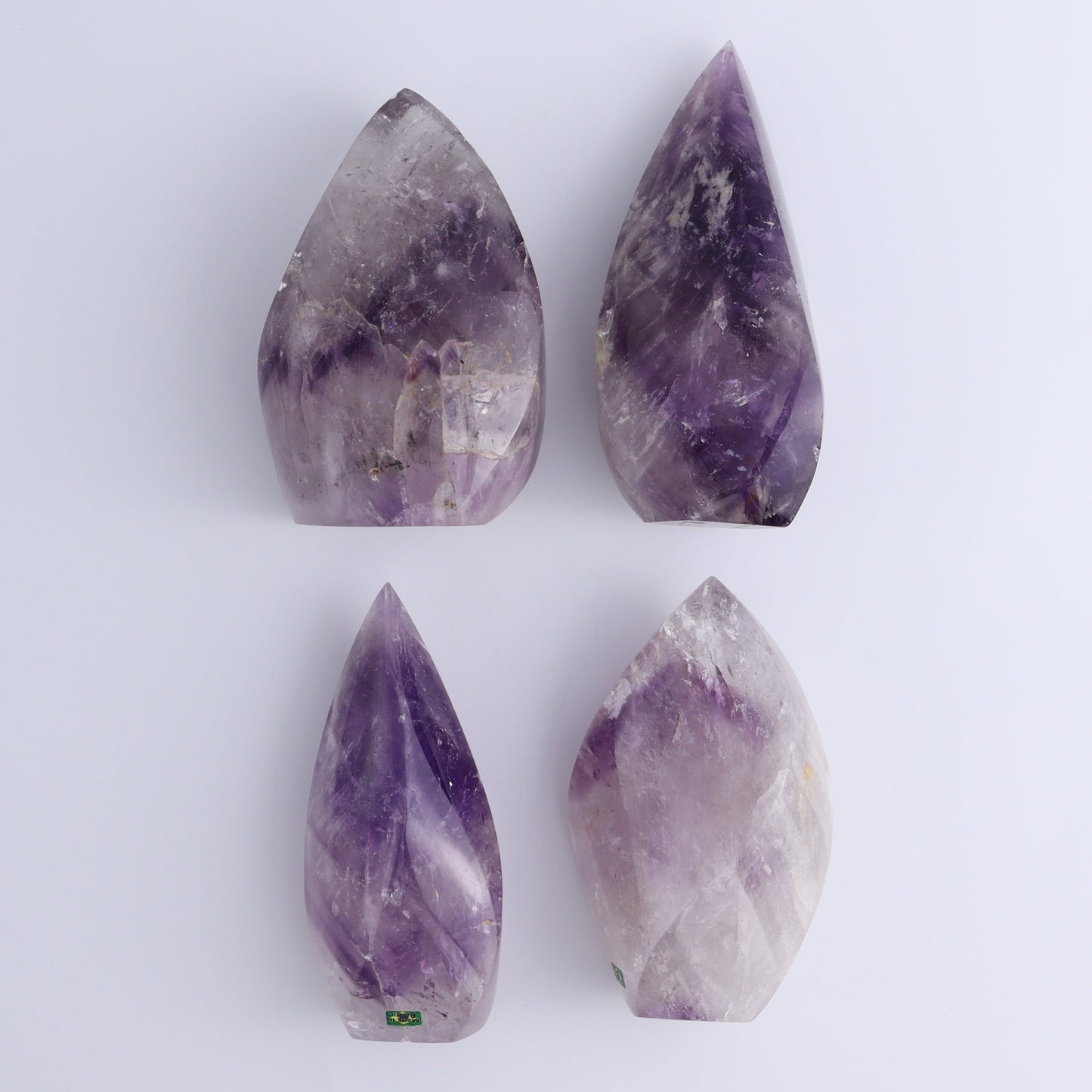 Imperfect Amethyst Flames Set of 4 - Expert Wholesale and Supplier of Wholesale Crystals & Bulk Gemstones, ["Amethyst","Brazil","close_30","flames"]