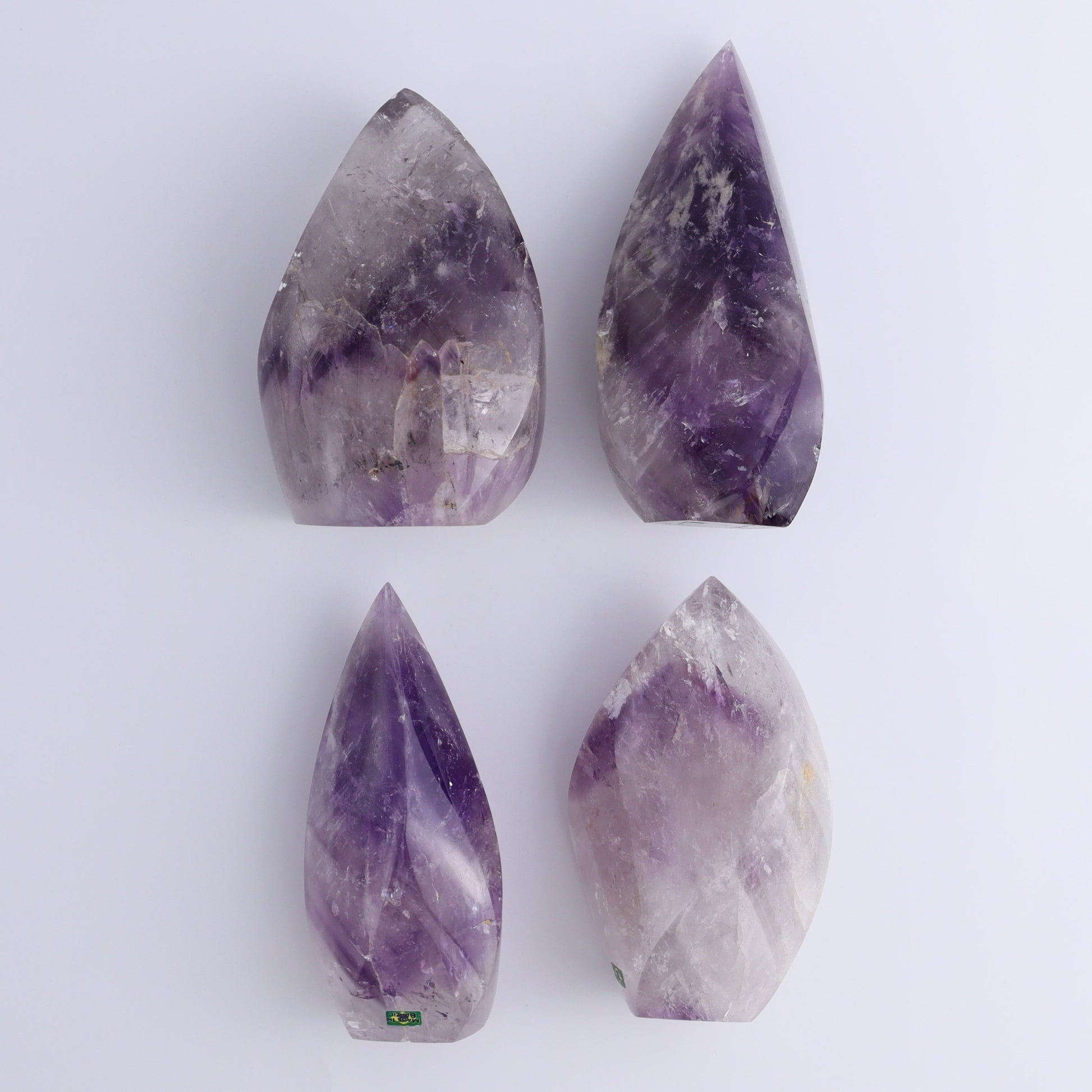 Imperfect Amethyst Flames Set of 4 - Expert Wholesale and Supplier of Wholesale Crystals & Bulk Gemstones, ["Amethyst","Brazil","close_30","flames"]