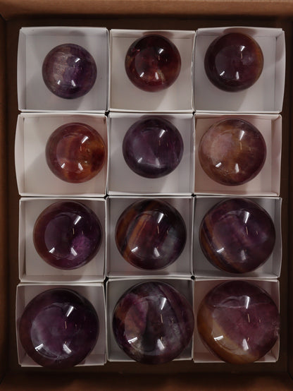 Fluorite Spheres Set of 12 - Expert Wholesale and Supplier of Wholesale Crystals & Bulk Gemstones, []