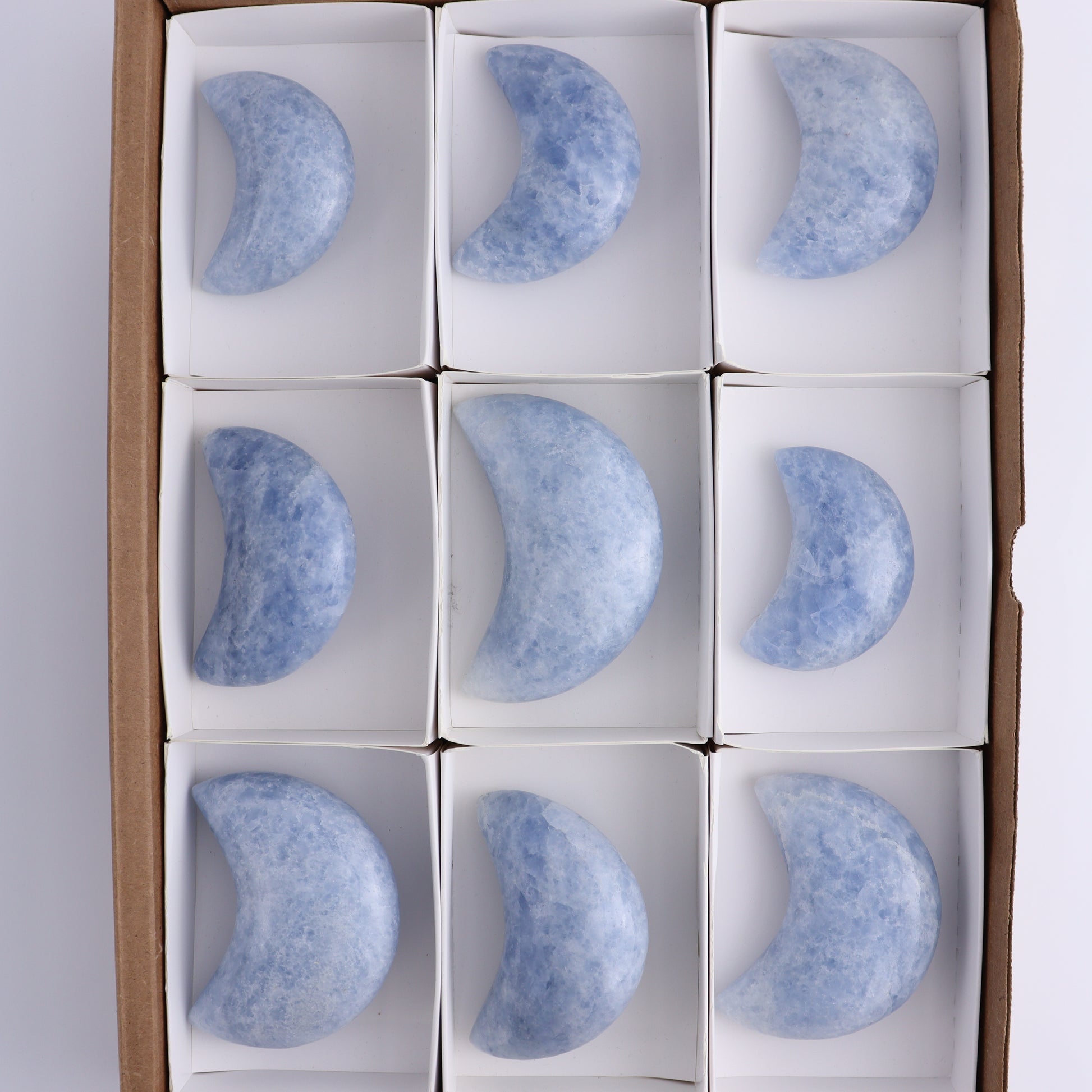 Blue Calcite Moons Set of 9 - Expert Wholesale and Supplier of Wholesale Crystals & Bulk Gemstones, ["Blue Calcite","Calcite","moons"]