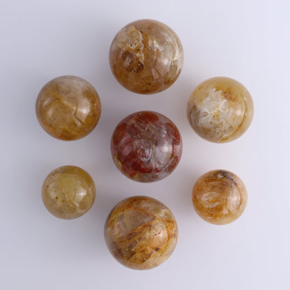 Fire Quartz Spheres Set of 7 - Expert Wholesale and Supplier of Wholesale Crystals & Bulk Gemstones, ["close_30","Fire Quartz","Quartz","Spheres"]