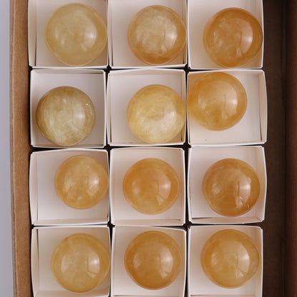 Honey Calcite Spheres Set of 12 - Expert Wholesale and Supplier of Wholesale Crystals & Bulk Gemstones, ["Calcite","Honey Calcite","Mexico","Spheres"]