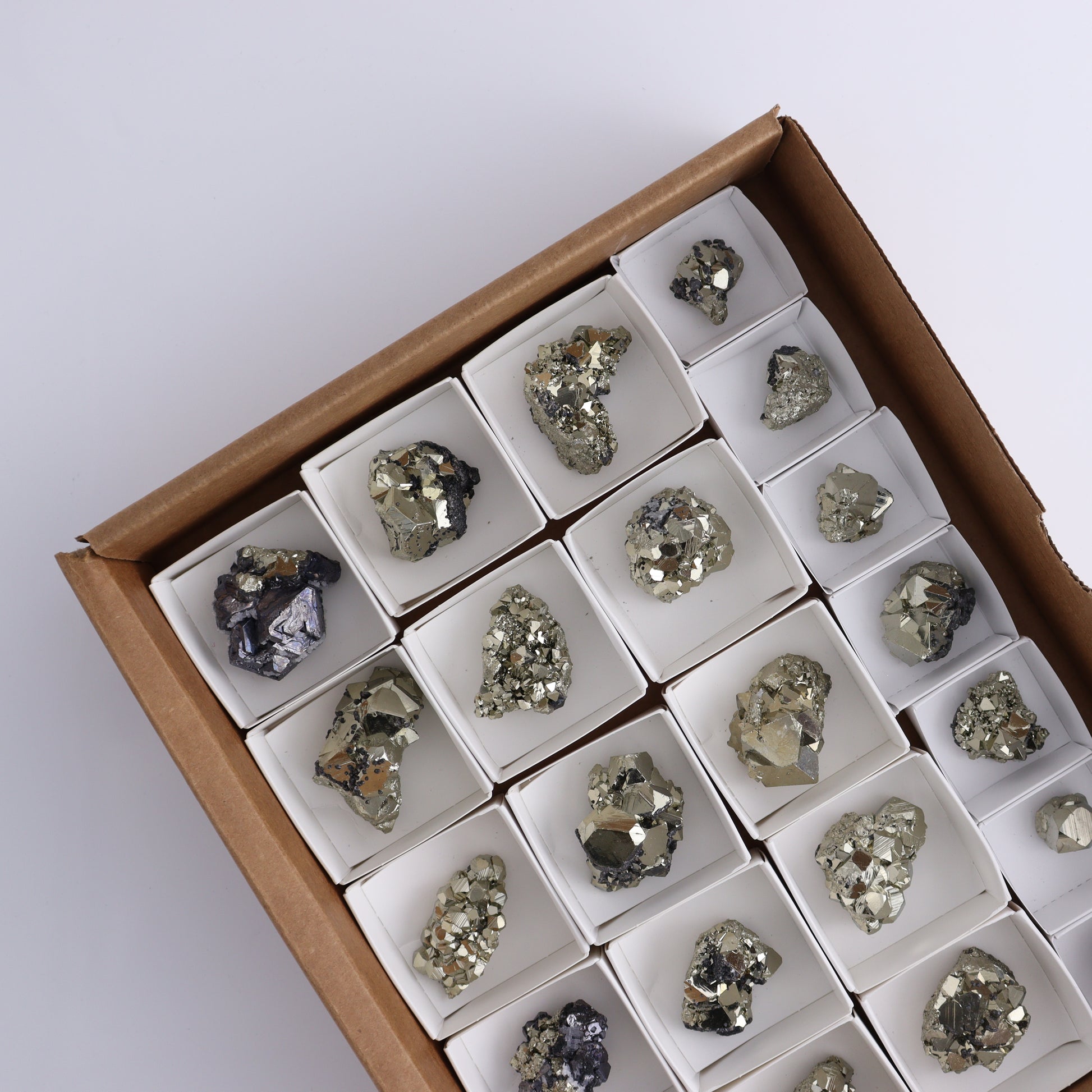 Octahedral Pyrite Clusters Set of 22 - Expert Wholesale and Supplier of Wholesale Crystals & Bulk Gemstones, ["Clusters","Octahedral Pyrite","Peru","Pyrite"]