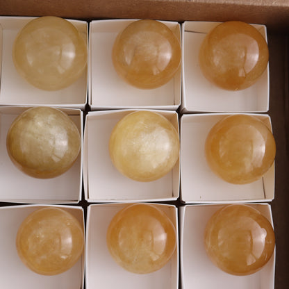 Honey Calcite Spheres Set of 12 - Expert Wholesale and Supplier of Wholesale Crystals & Bulk Gemstones, ["Calcite","Honey Calcite","Mexico","Spheres"]