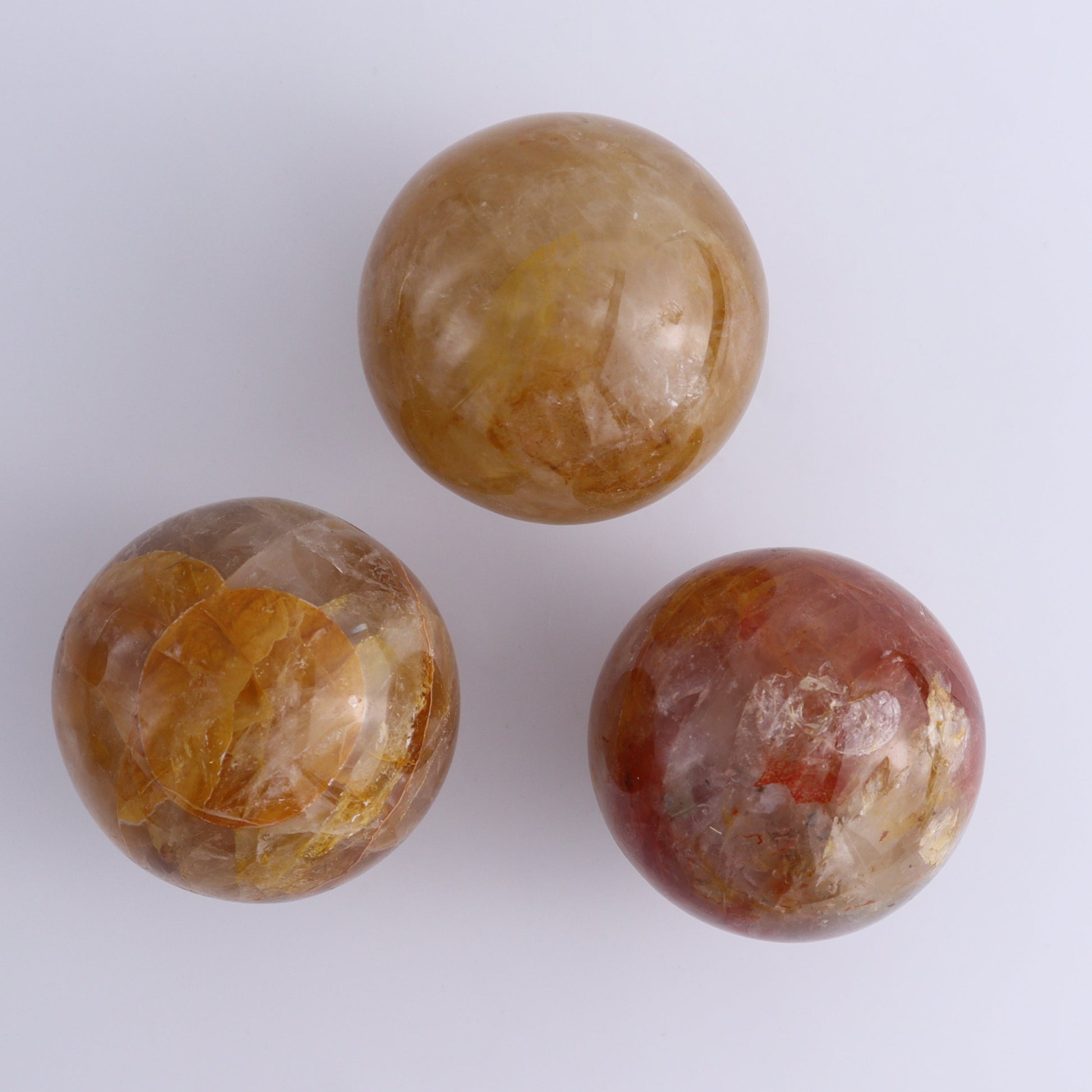 Fire Quartz Spheres Set of 7 - Expert Wholesale and Supplier of Wholesale Crystals & Bulk Gemstones, ["close_30","Fire Quartz","Quartz","Spheres"]