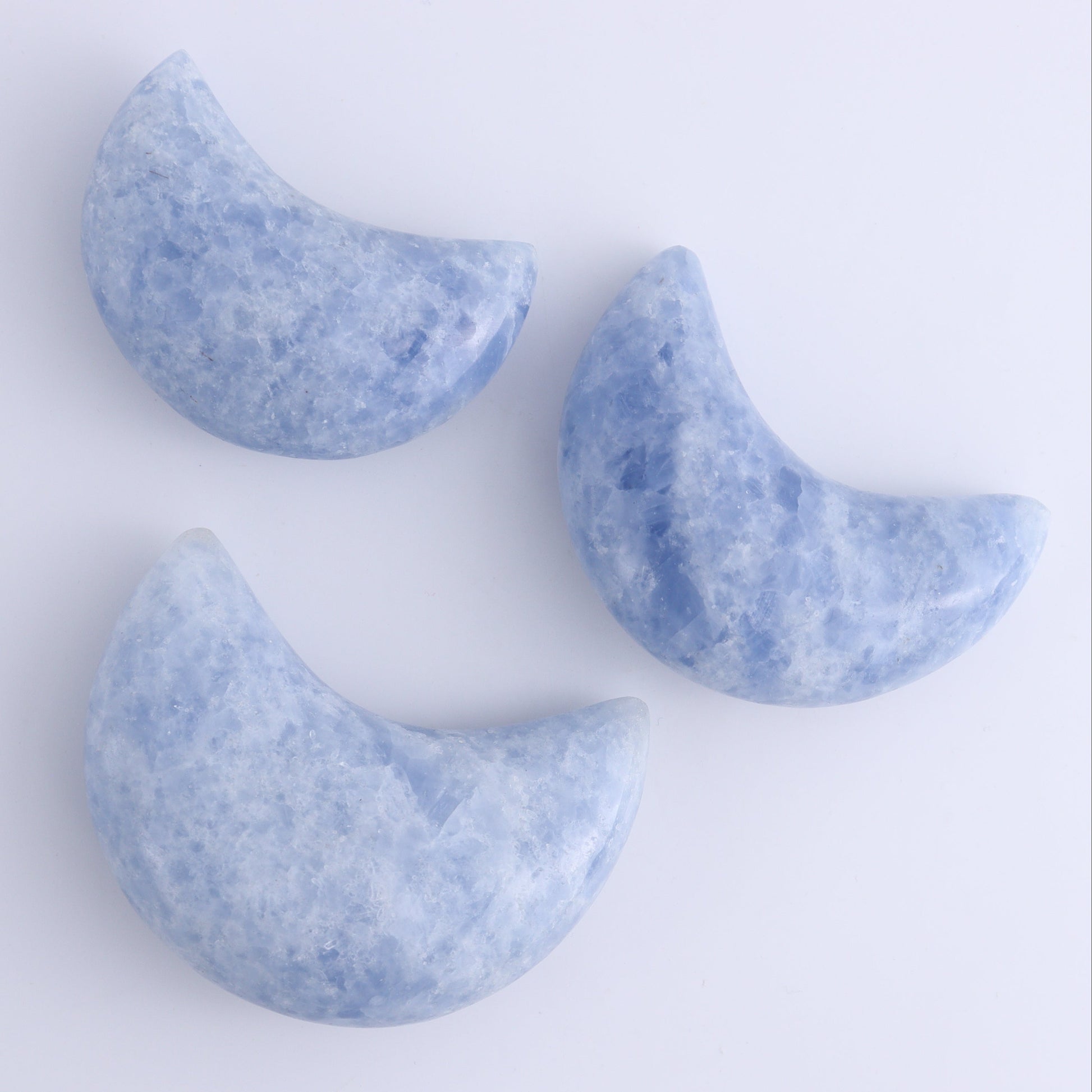 Blue Calcite Moons Set of 9 - Expert Wholesale and Supplier of Wholesale Crystals & Bulk Gemstones, ["Blue Calcite","Calcite","moons"]