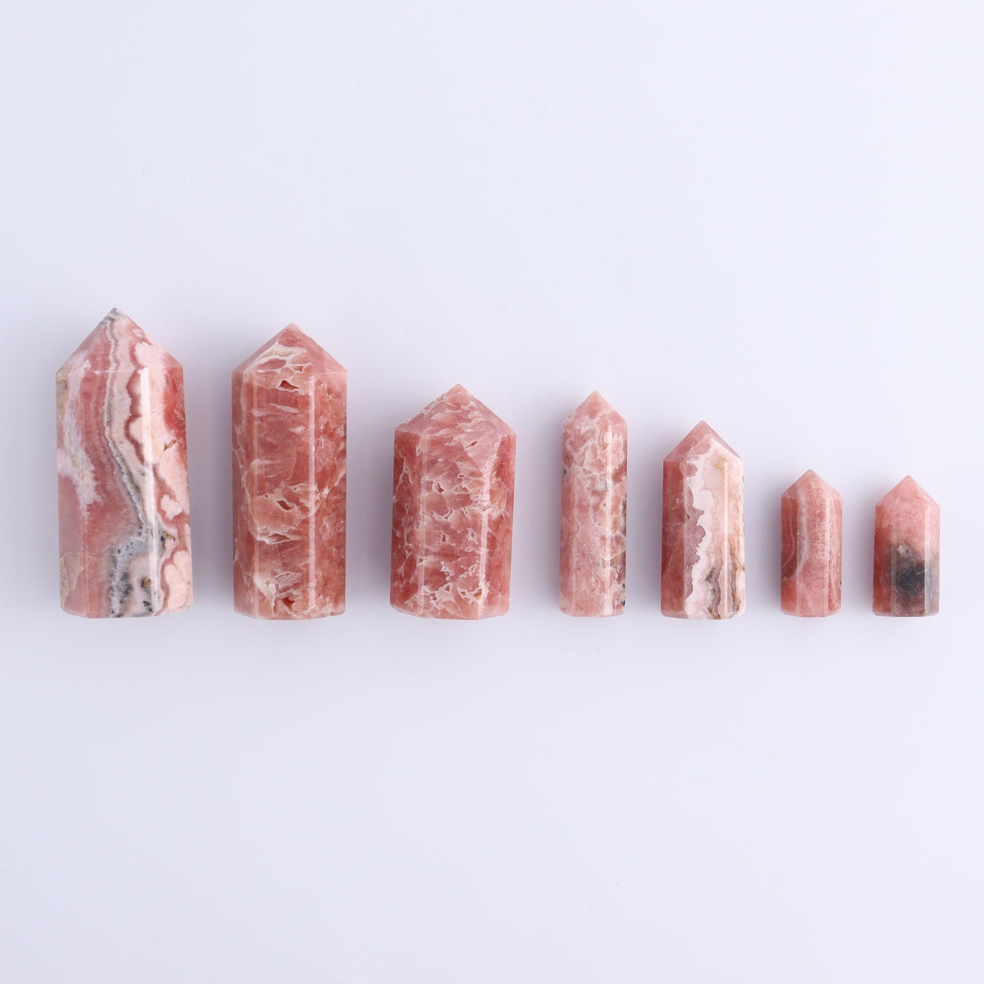 Rhodochrosite Towers Set of 7 - Expert Wholesale and Supplier of Wholesale Crystals & Bulk Gemstones, ["Argentina","Rhodochrosite","Towers"]