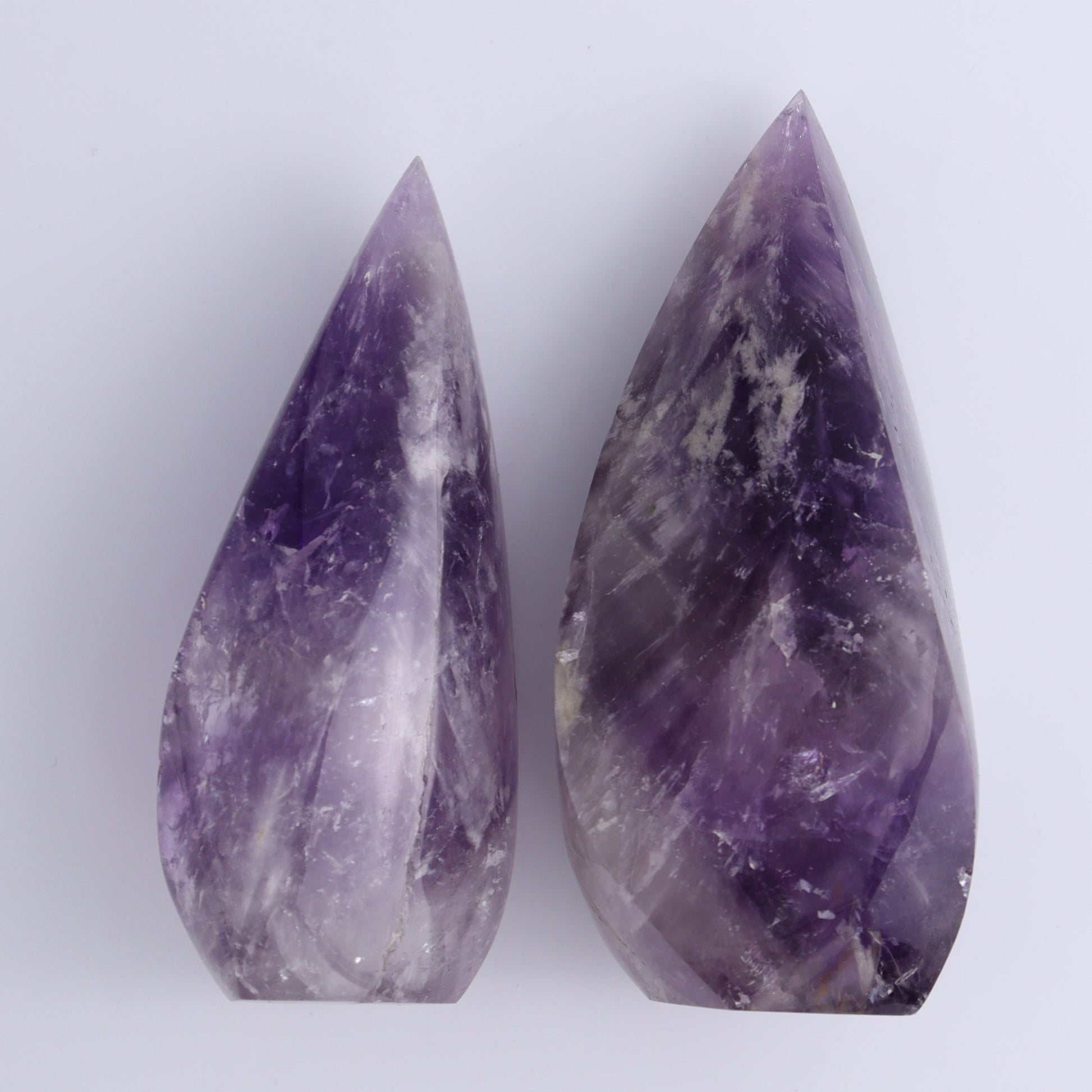 Imperfect Amethyst Flames Set of 4 - Expert Wholesale and Supplier of Wholesale Crystals & Bulk Gemstones, ["Amethyst","Brazil","close_30","flames"]