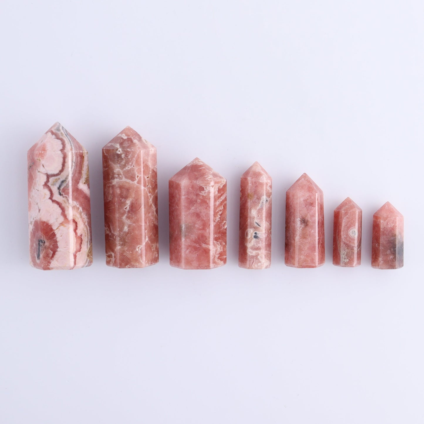 Rhodochrosite Towers Set of 7 - Expert Wholesale and Supplier of Wholesale Crystals & Bulk Gemstones, ["Argentina","Rhodochrosite","Towers"]