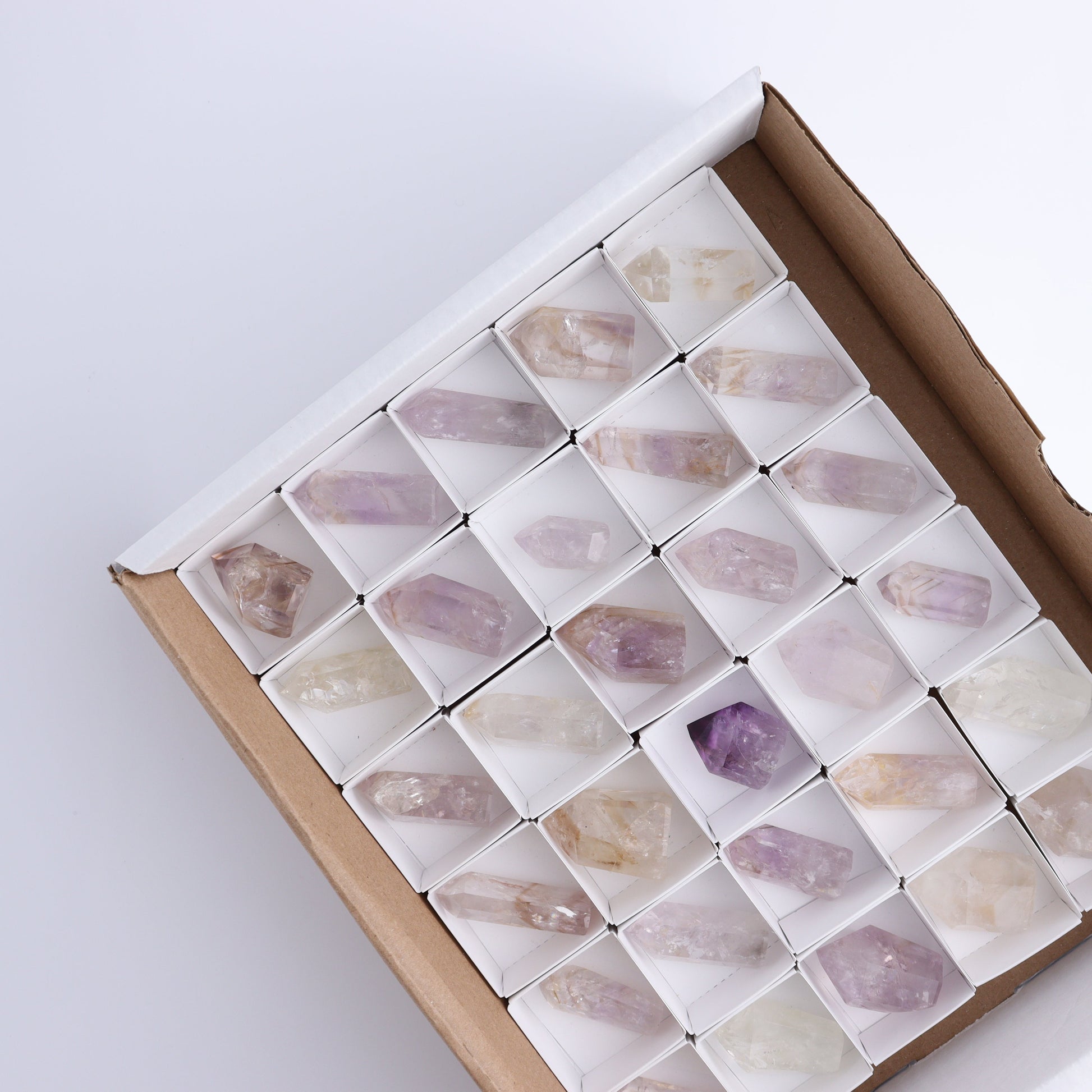 Powellite Amethyst UV Reactive Towers Set of 30 - Expert Wholesale and Supplier of Wholesale Crystals & Bulk Gemstones, ["Amethyst","Powellite"]
